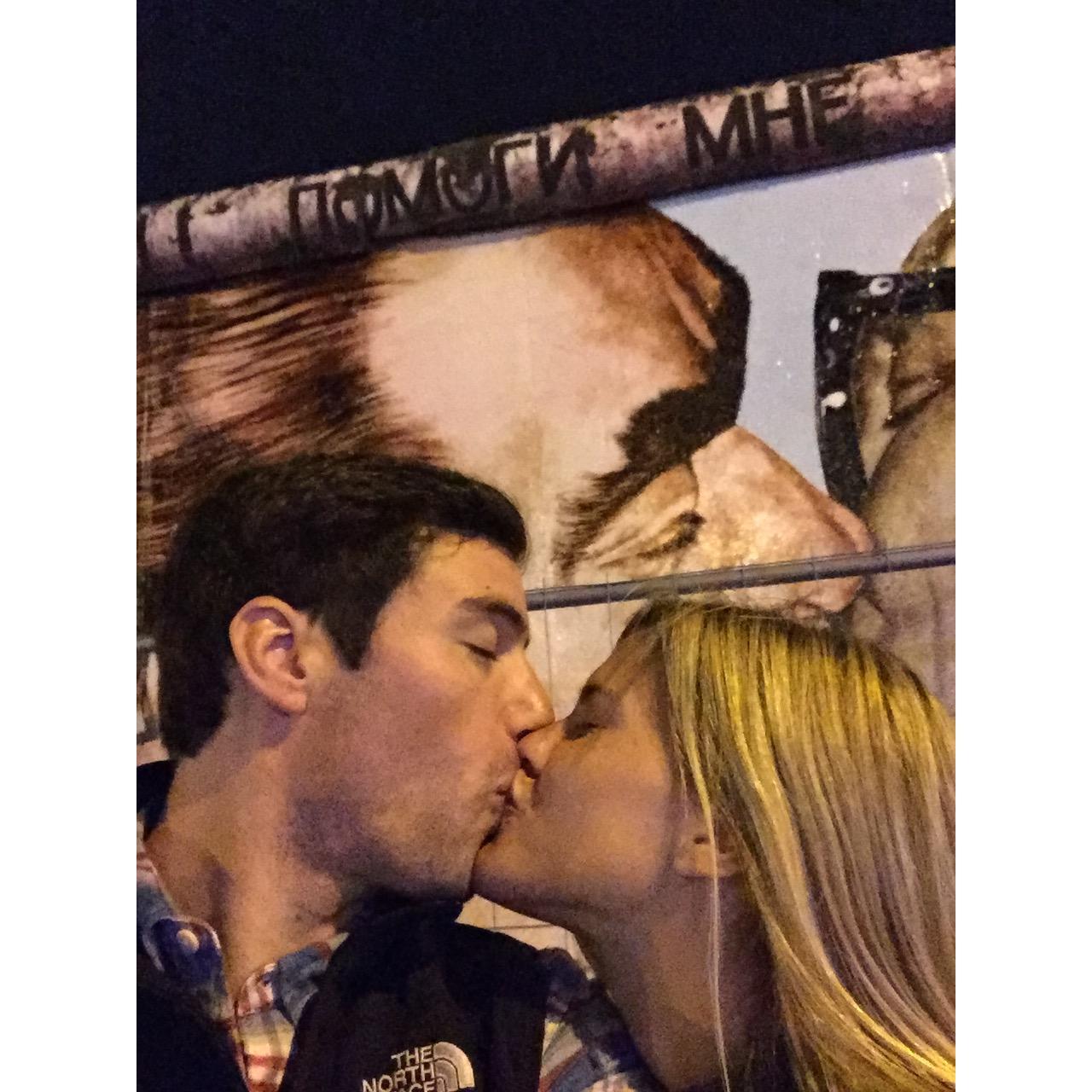 In front of one of the last remaining sections of the Berlin Wall. Berlin, Germany. 09/2016