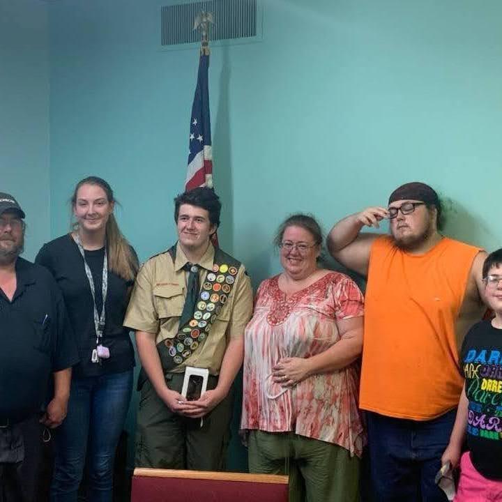 The day Geoffrey received his Eagle Scout award with his family surrounding him!