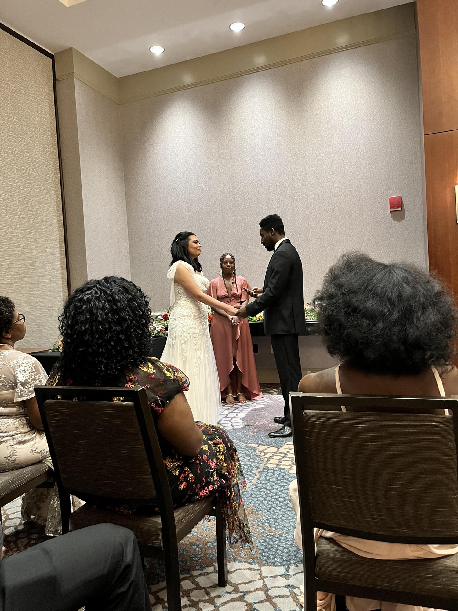 Our vow exchange, officiated by Yelnats’s sister, Angel. Angel went to Harvard Divinity school and we are so blessed to be the first couple she’s married.