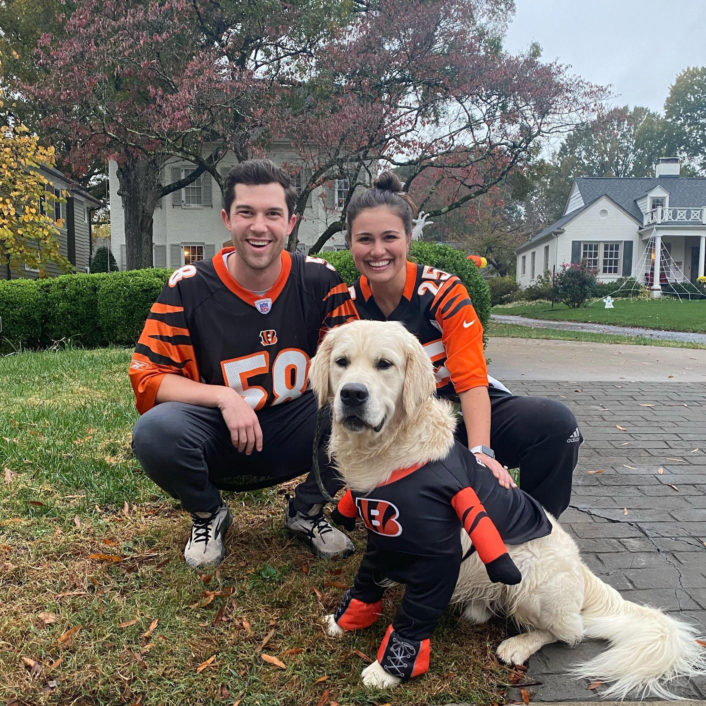 This photo captures Paige's true love - Bandy, as well as Brad's first love - the Bengals!
