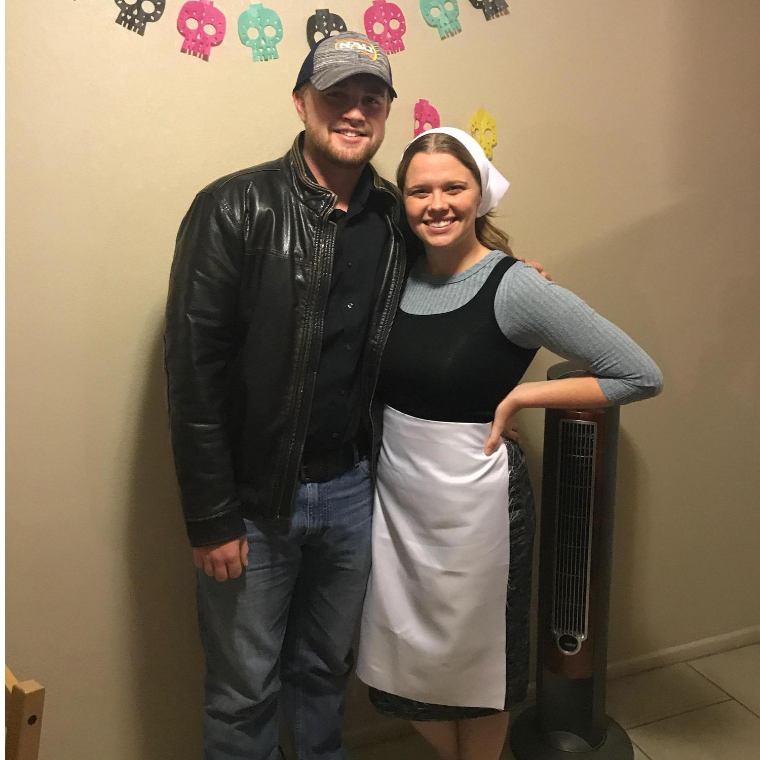 The first picture we took as a couple! This was during a Halloween party with our church small group. Grant was dressed as Zach (one of the groomsmen), and I dressed up as Cinderella!