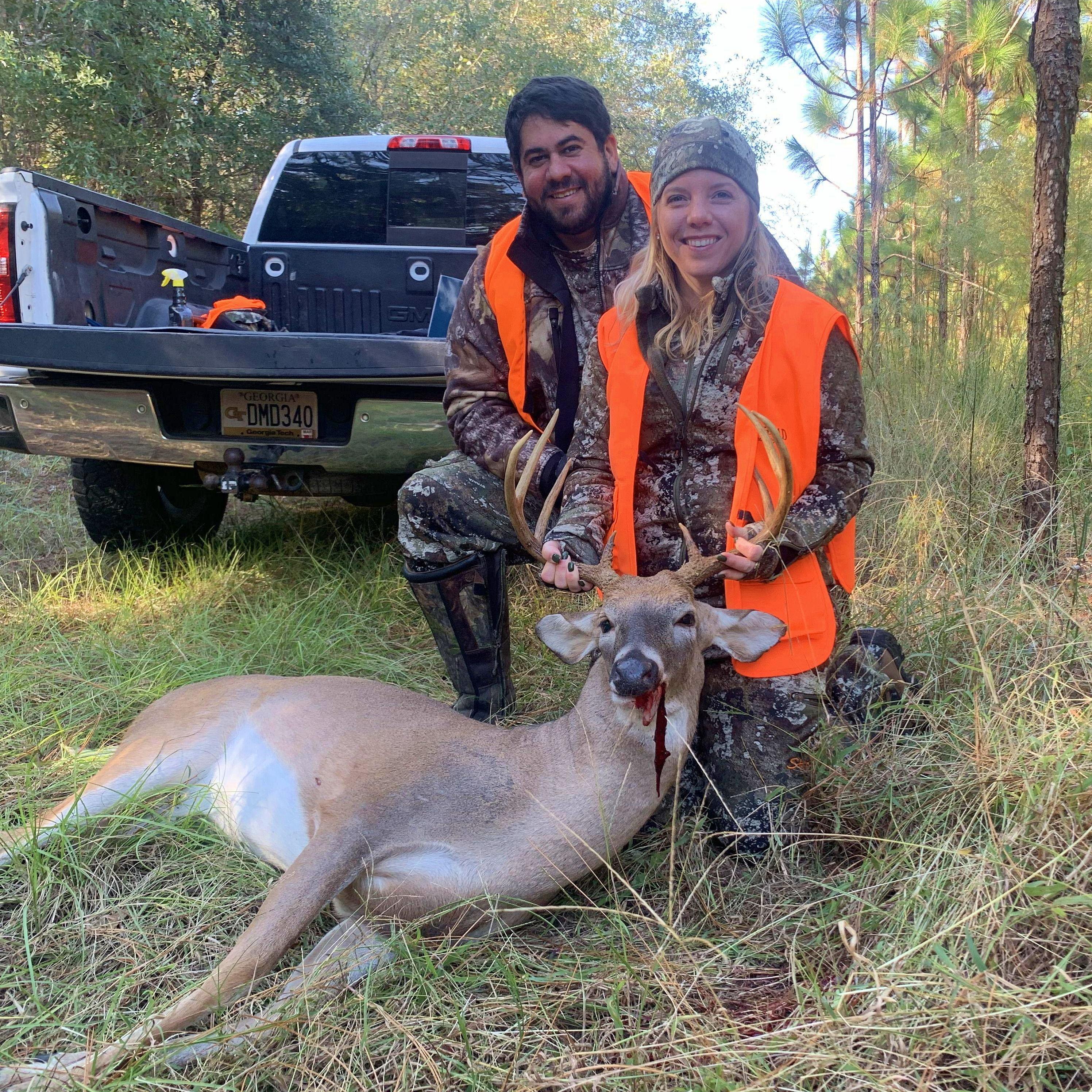 Micki's first buck and a very proud Joshua