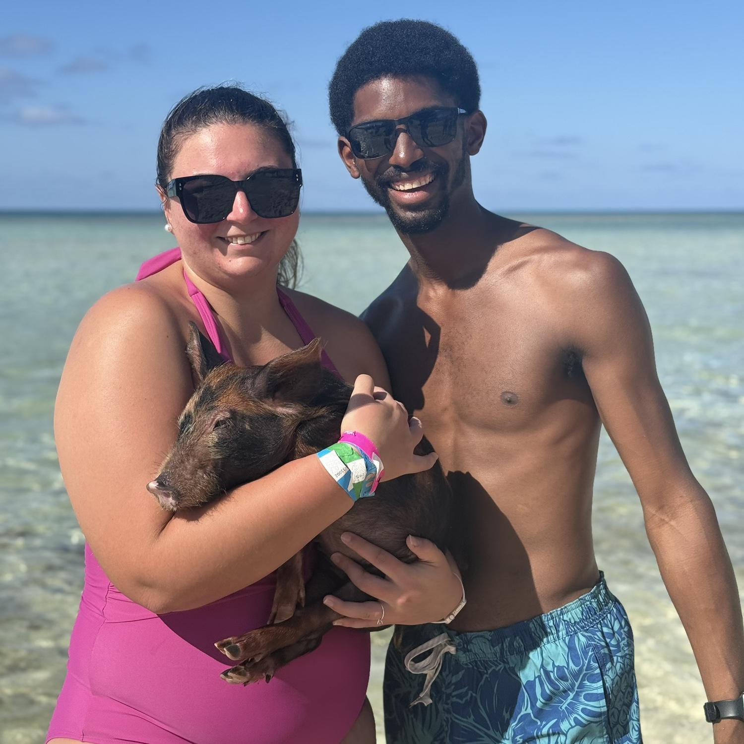 Our first cruise together where we swam with pigs!