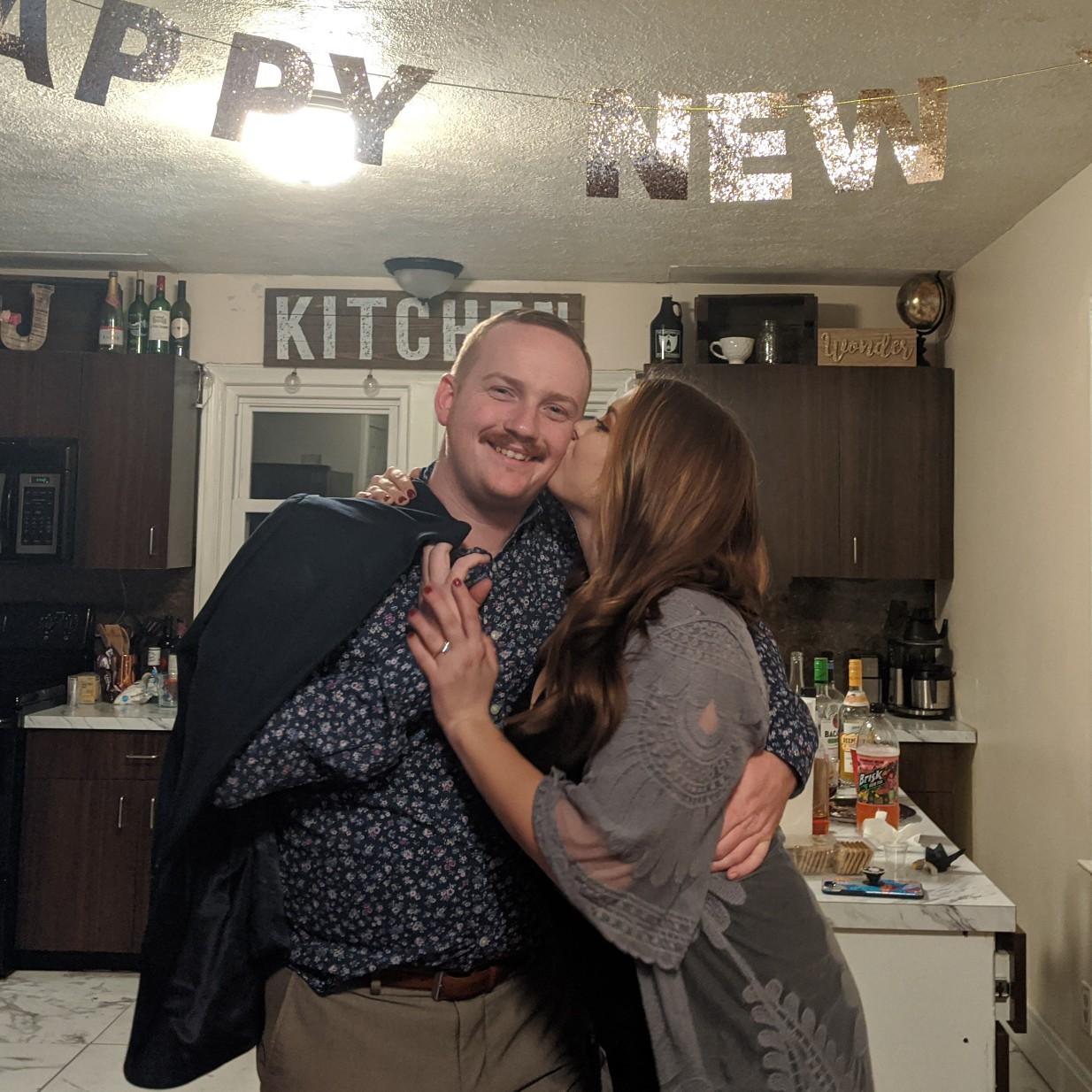 Ringing in the New Year as fiancés.