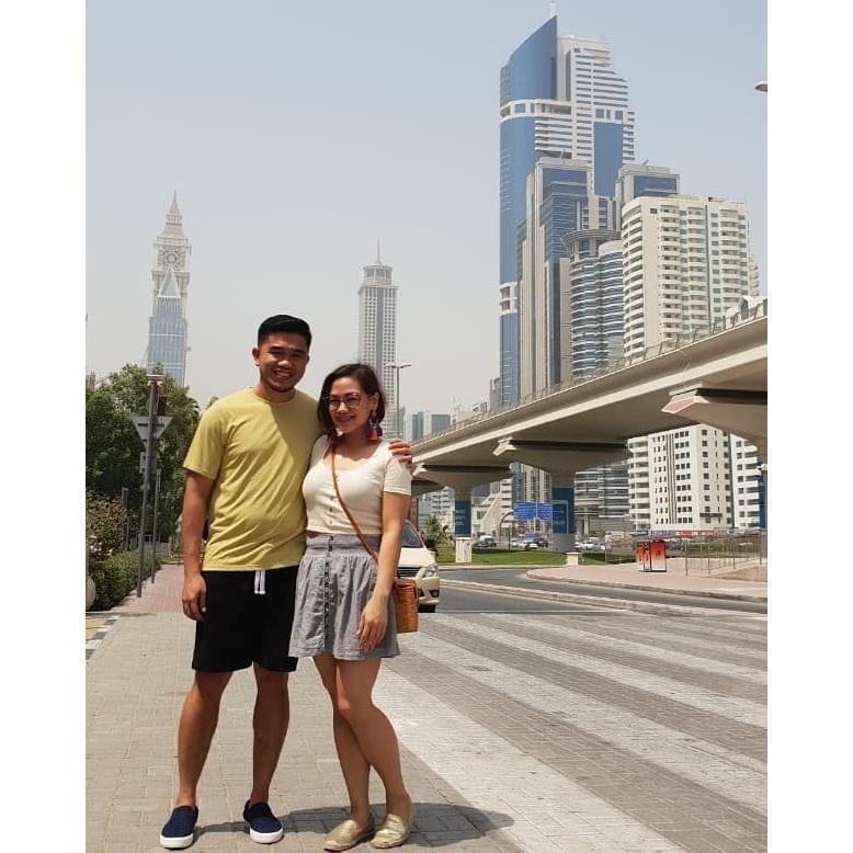 Smiling despite the sweltering desert heat of Dubai.