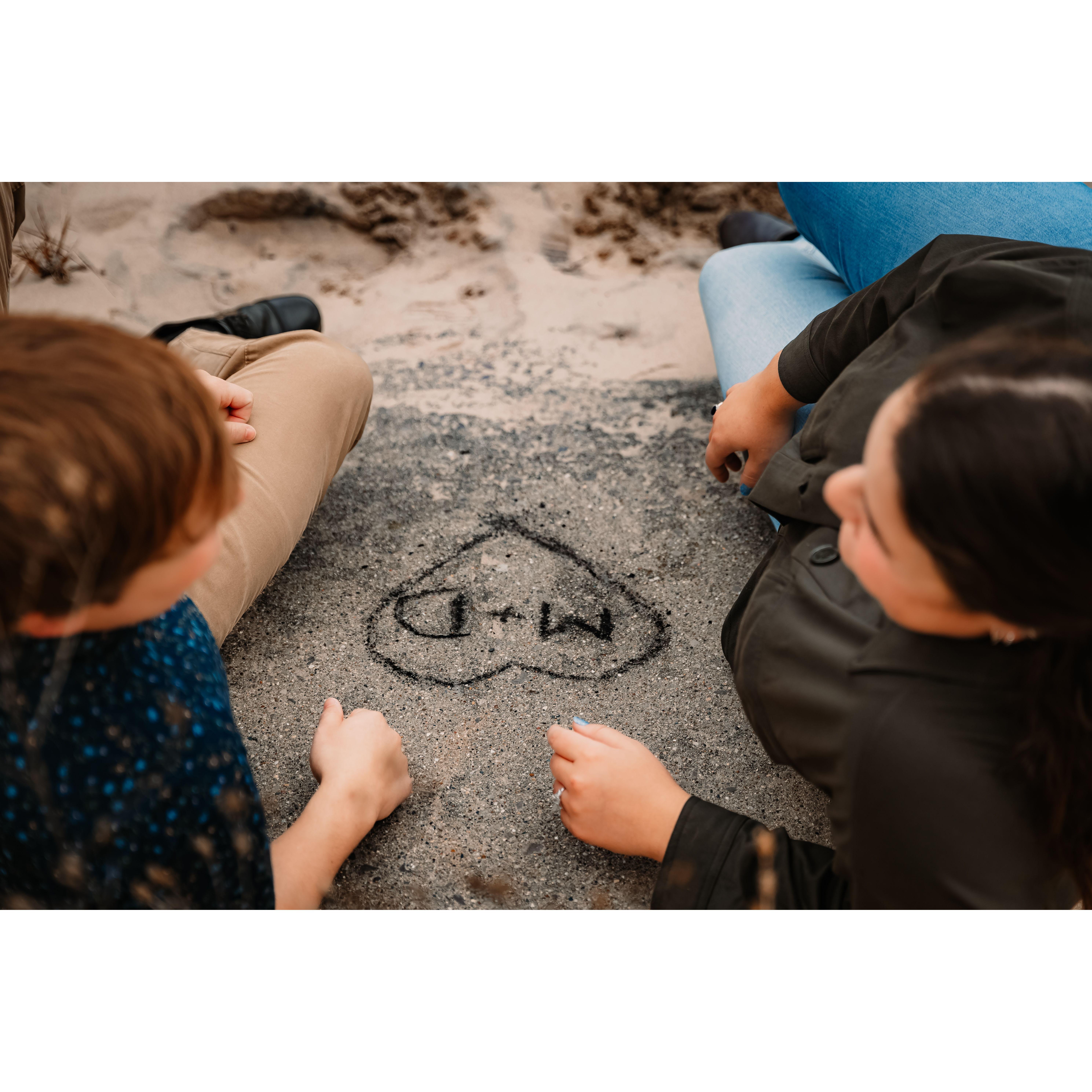 When Danielle was younger she would write M+D on the seawall in charcoal found on the beach. She was "secretly" in in love with Michael.