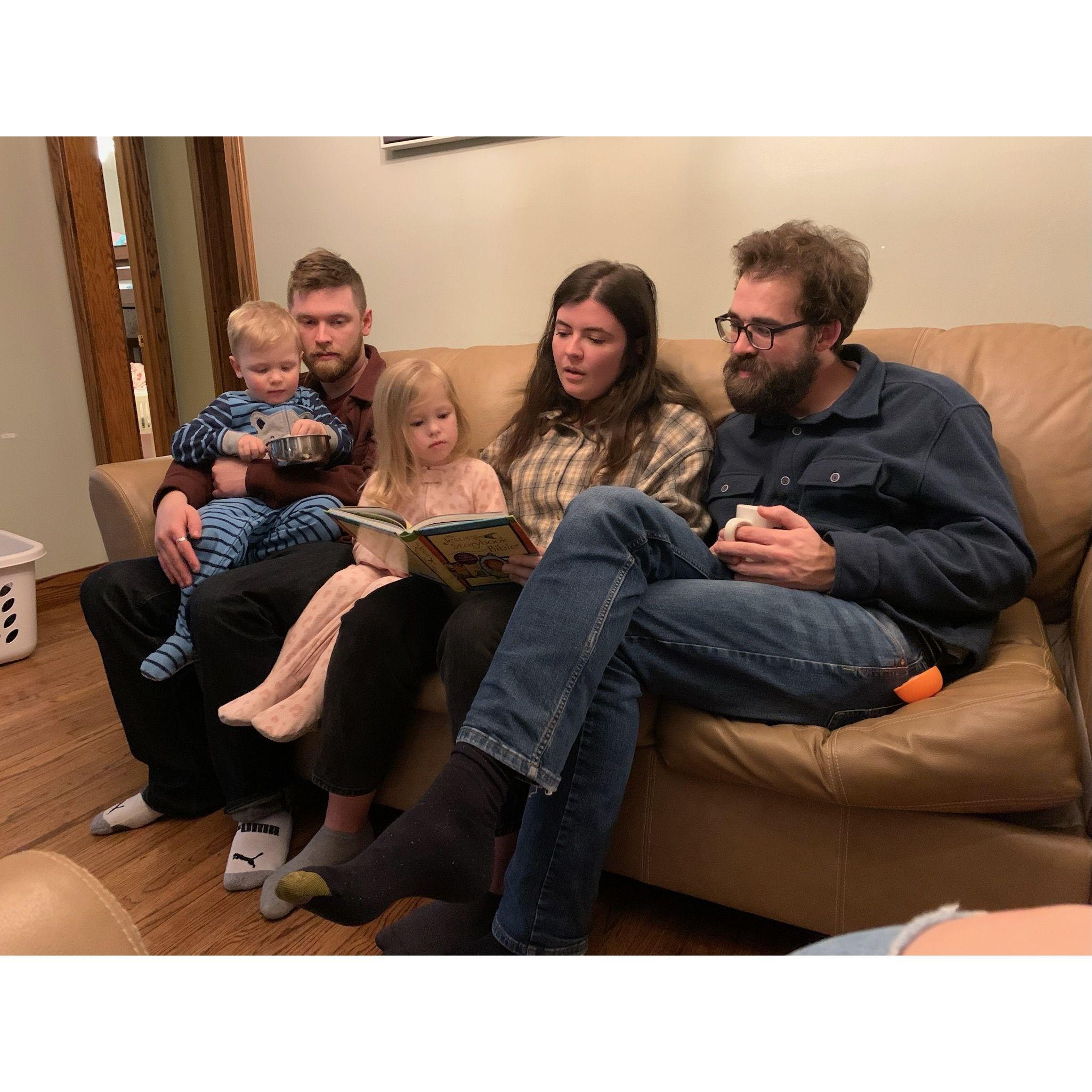 reading to flower girl Margo