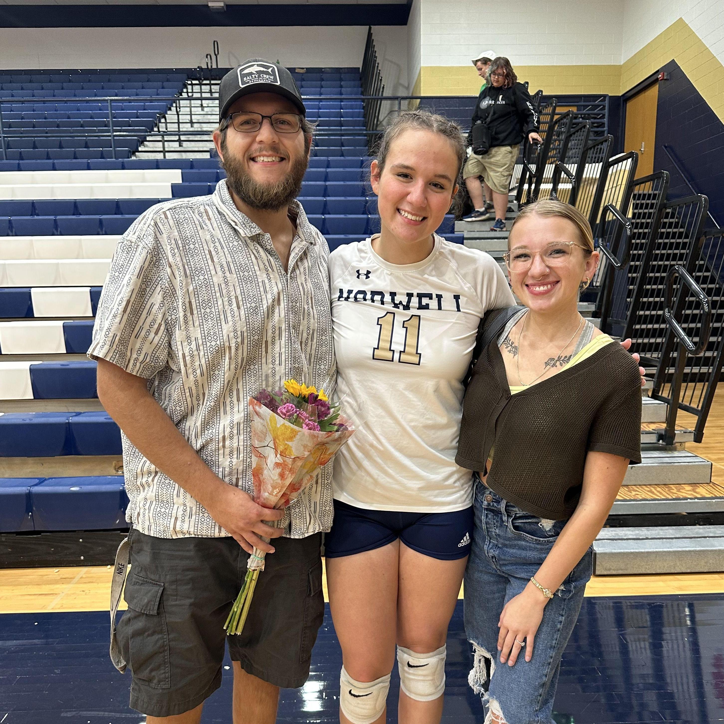 Ethan, Jenna, and Sydney at Jenna's senior night