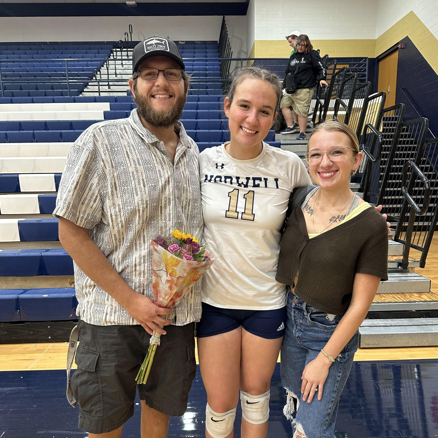 Ethan, Jenna, and Sydney at Jenna's senior night