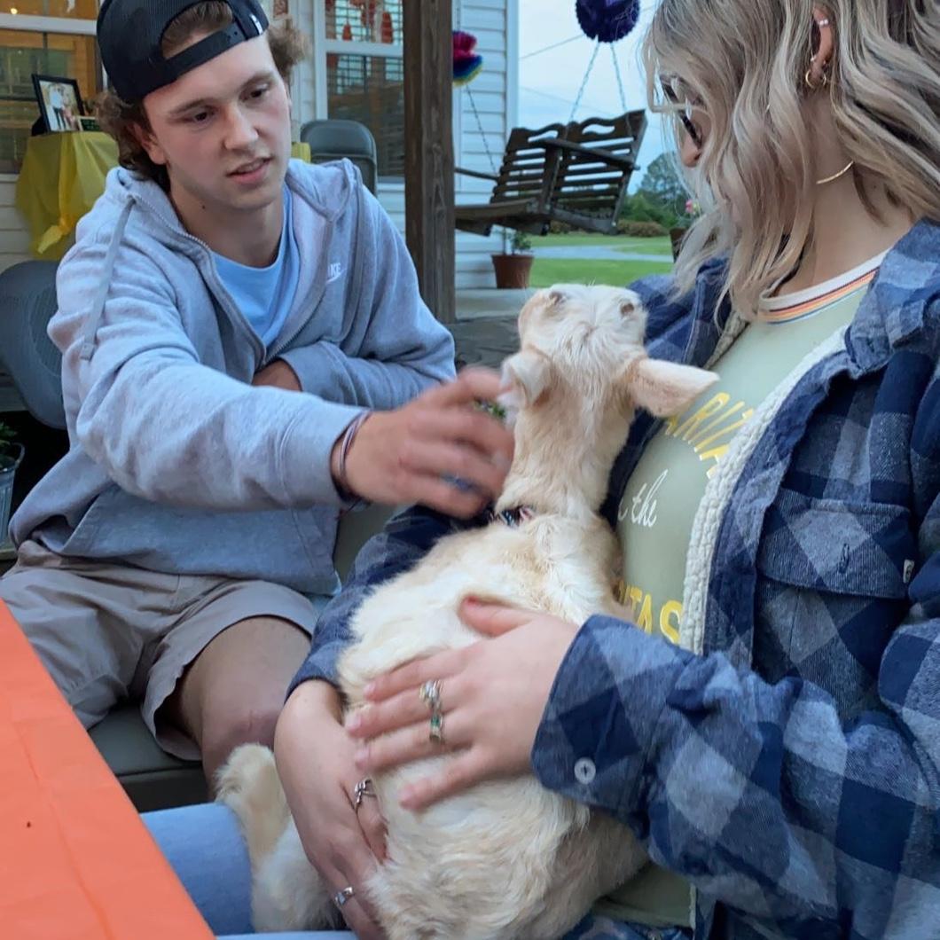 The day we met & the goat he made me hold to get my digits!
