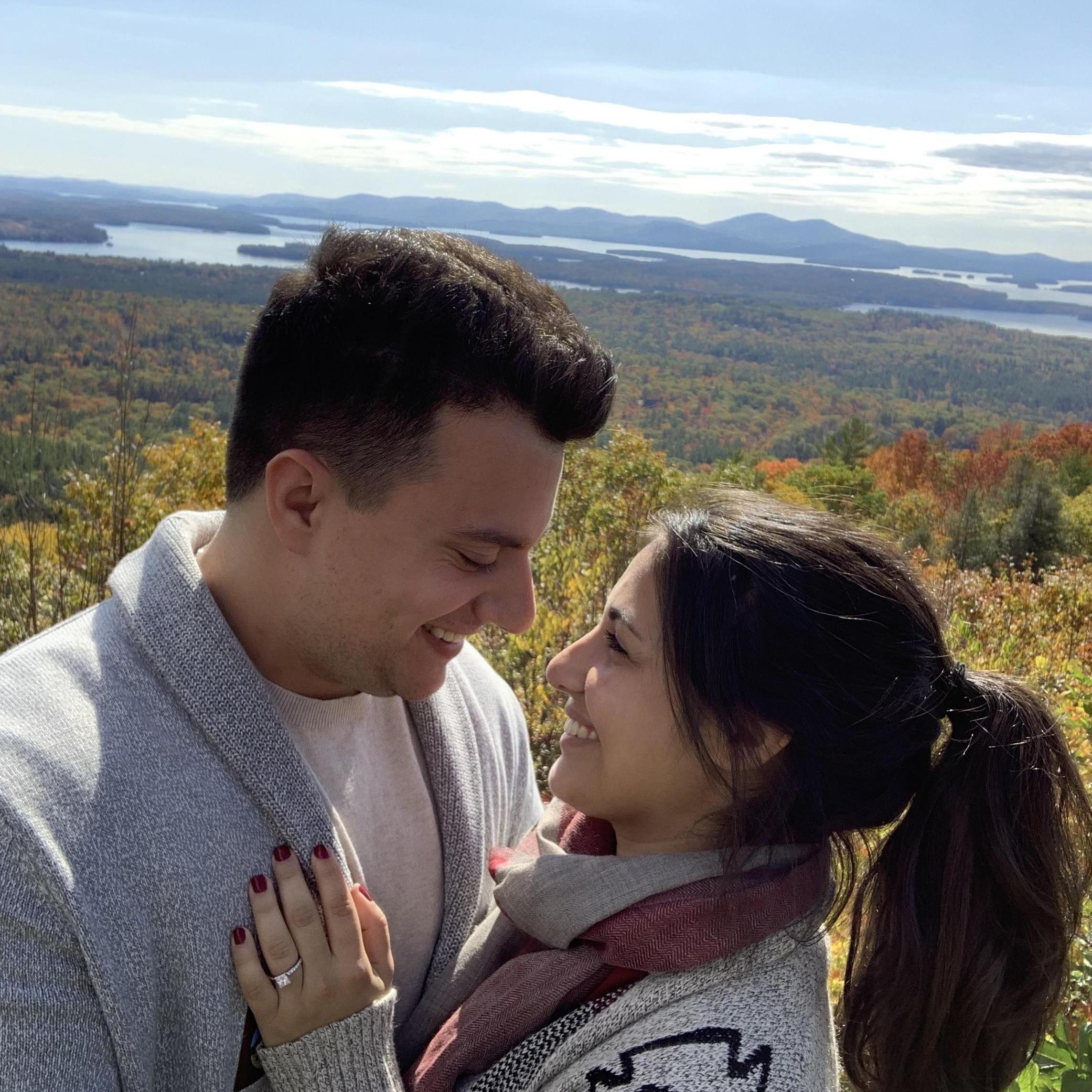 At the top of Castle in the Clouds in Moultonborough, New Hampshire shortly after Athan proposed.