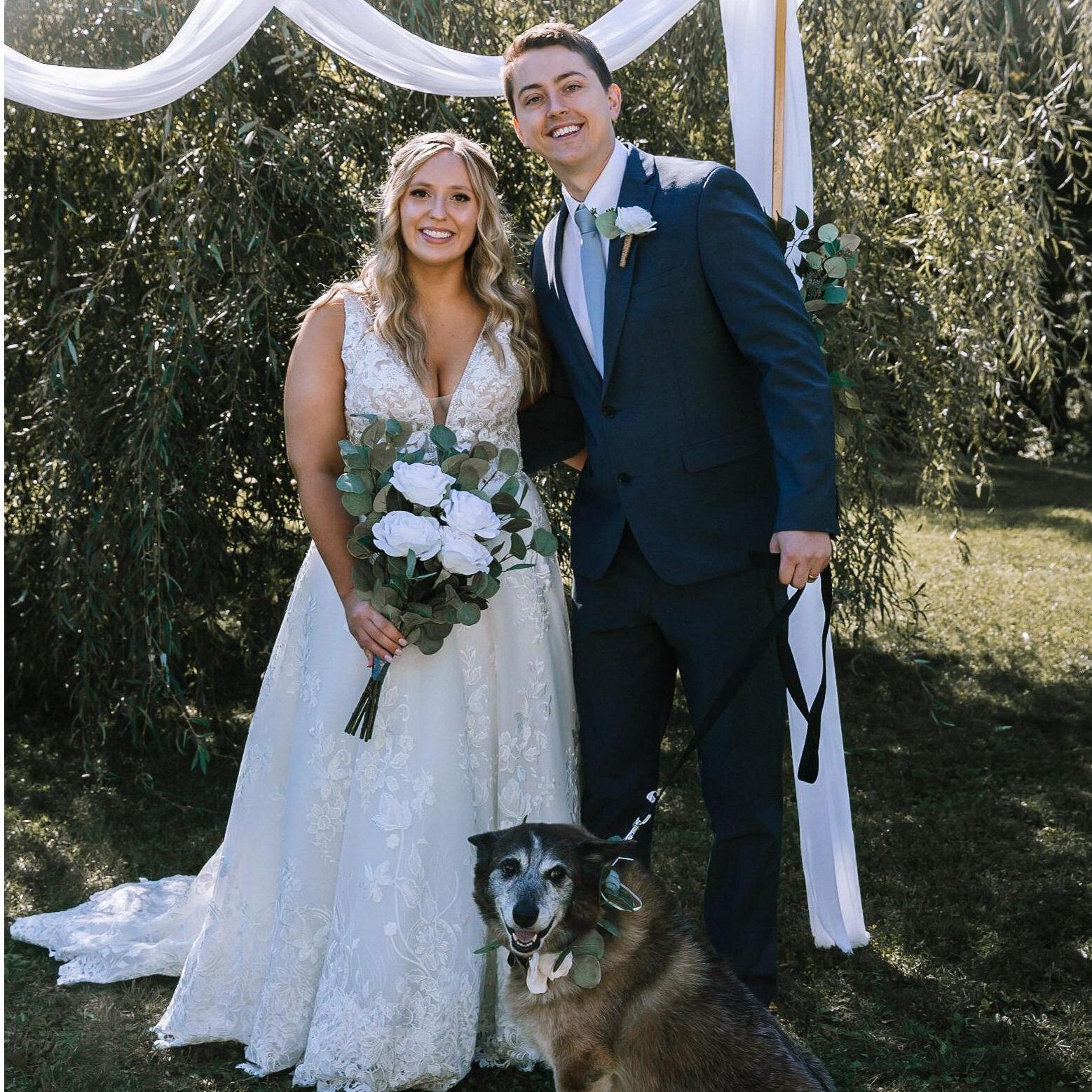 the best part of getting married in Crystal's parent's backyard was having daisy in the wedding!