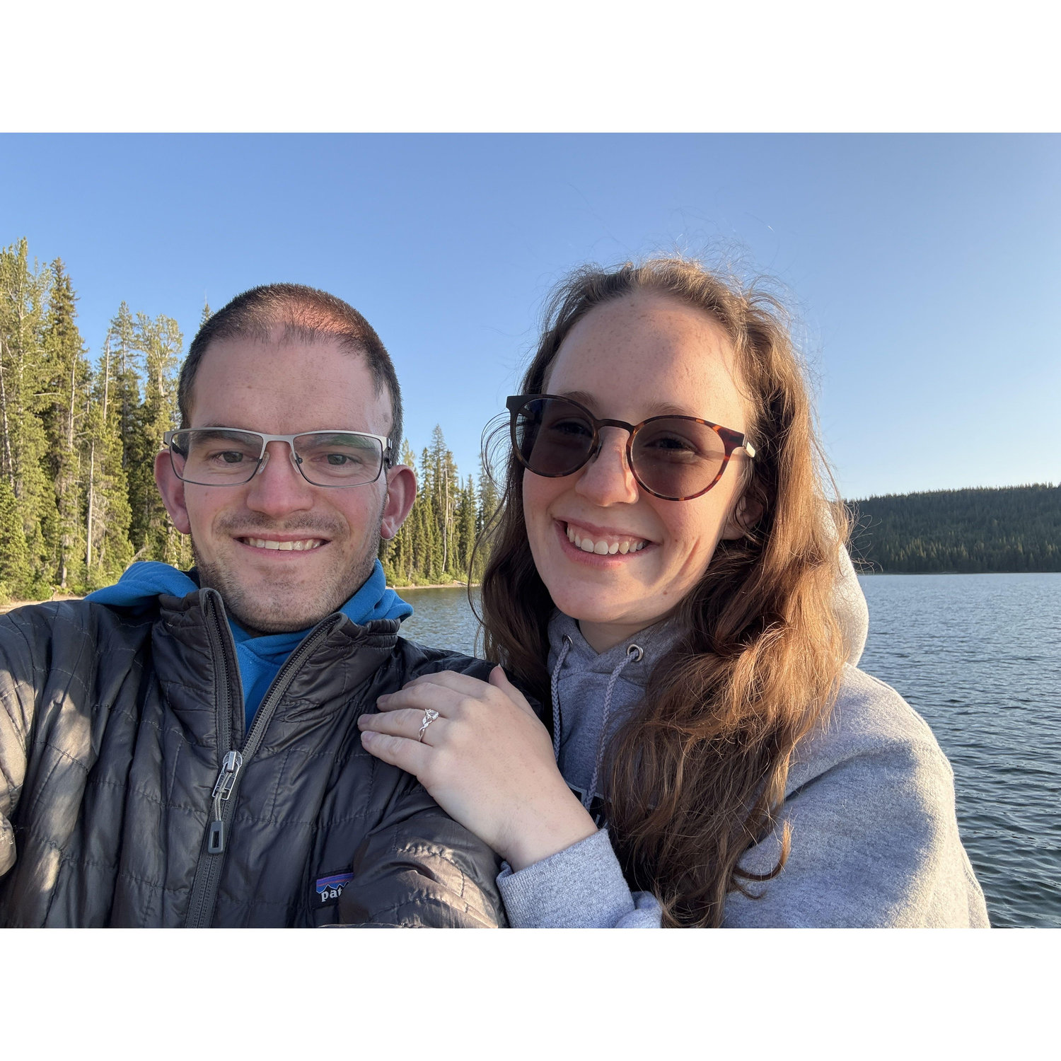 Got engaged at Yellowstone Park! Michael popped the question to Sam at Lewis Lake with four bystanders in kayaks watching. They waved their hands in cheer!