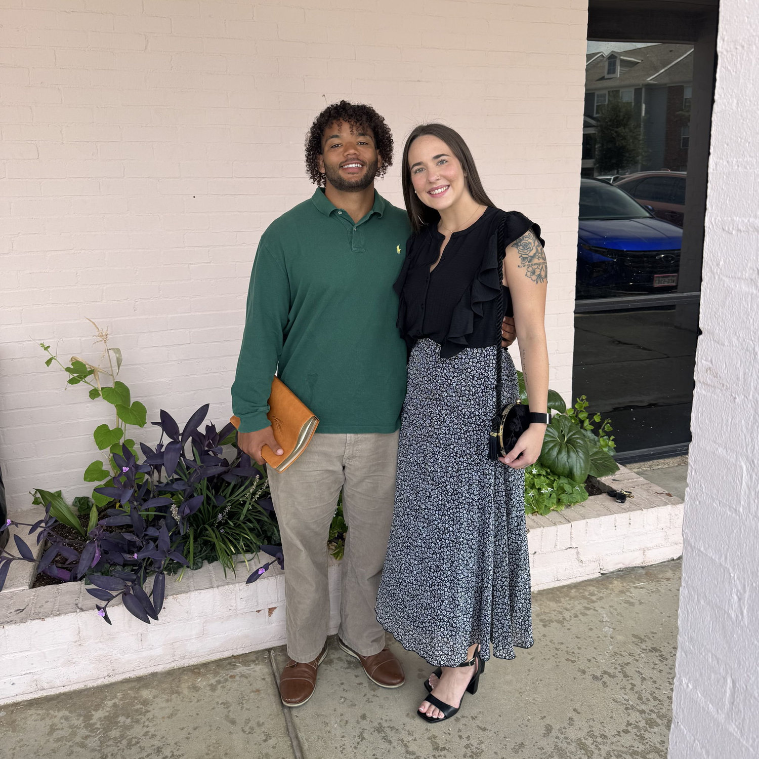 The first picture they ever took together, and it was his first time going to her church!
