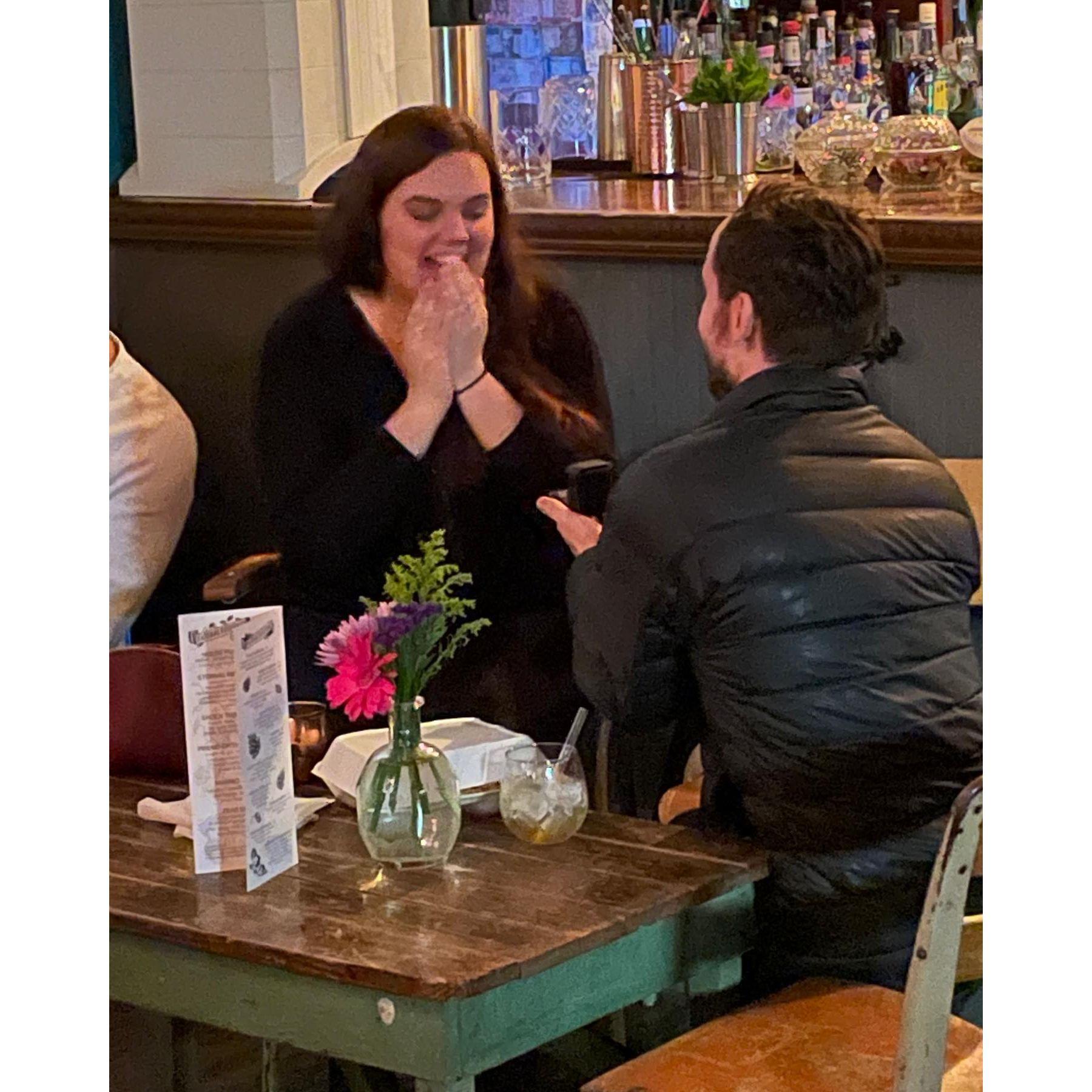 Joel proposed to Alex at The Bottle Shop — the same place they had their first date!