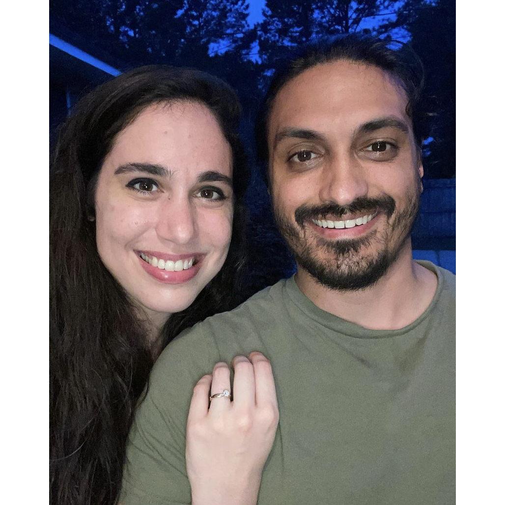Newly engaged and sitting on the front porch.