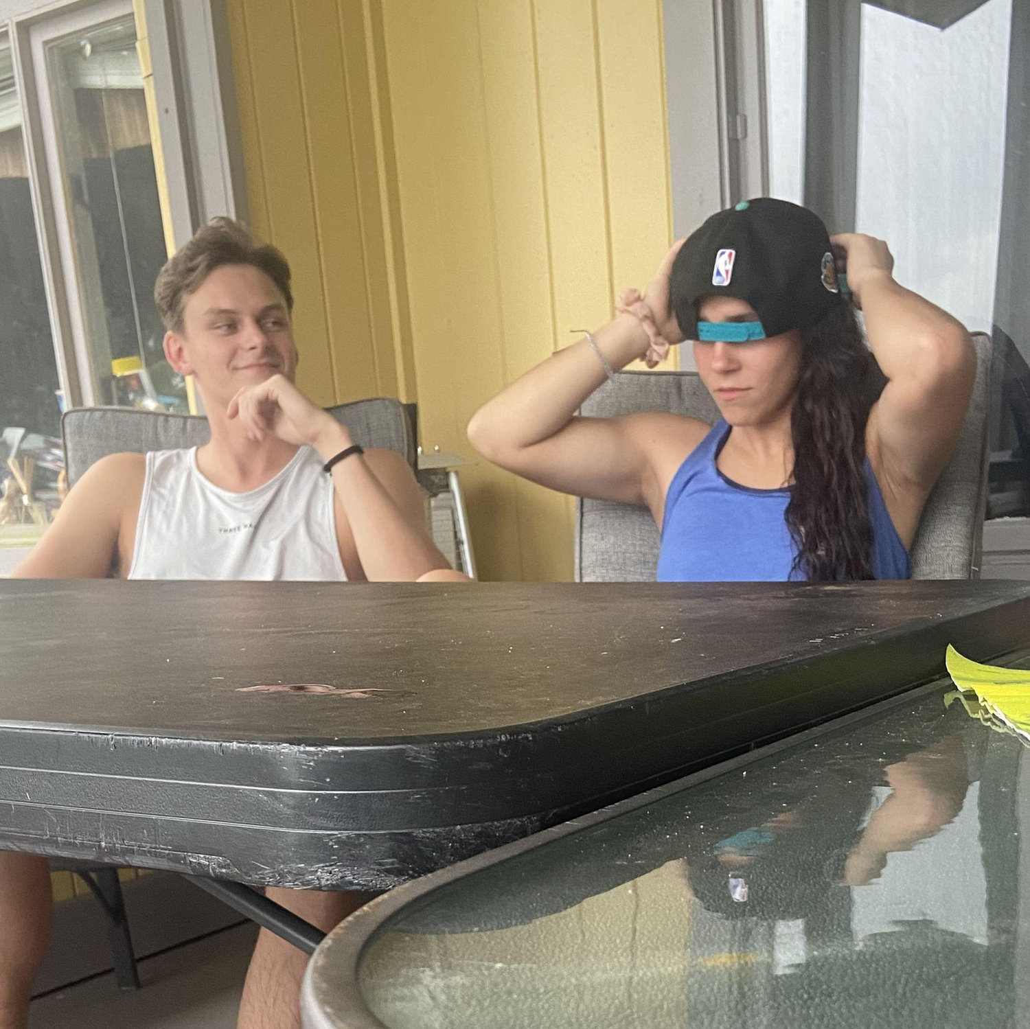 July 2025 - Maliea trying on Jake's hat.