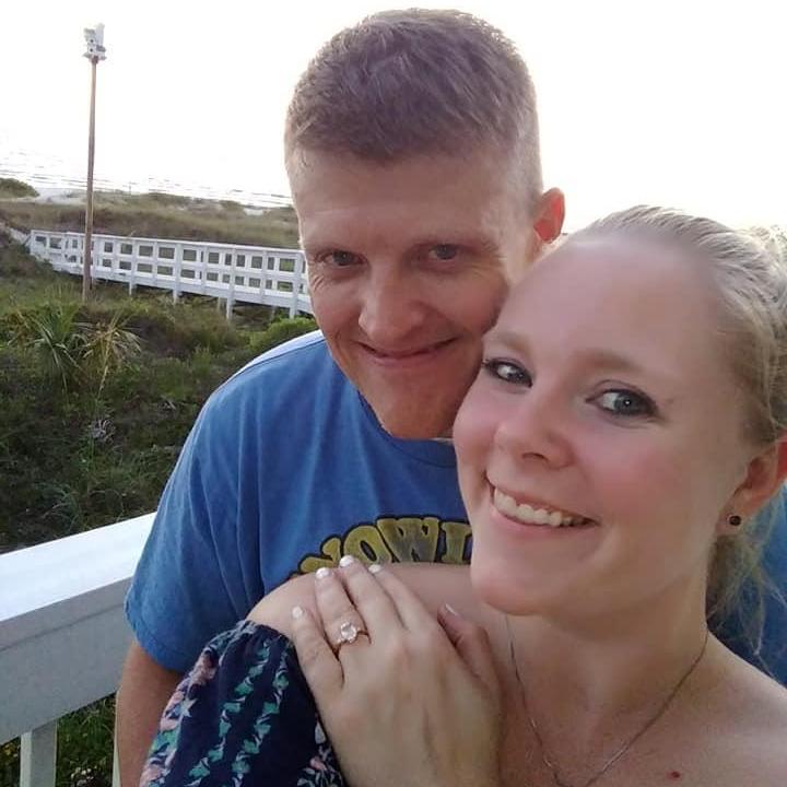 When he proposed at the beach at sunset