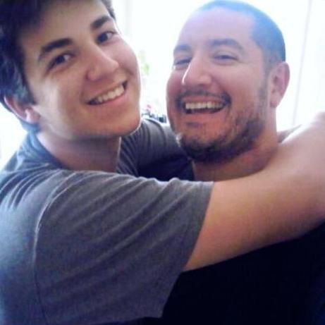 Robert hugs his uncle Cesar, 2011.