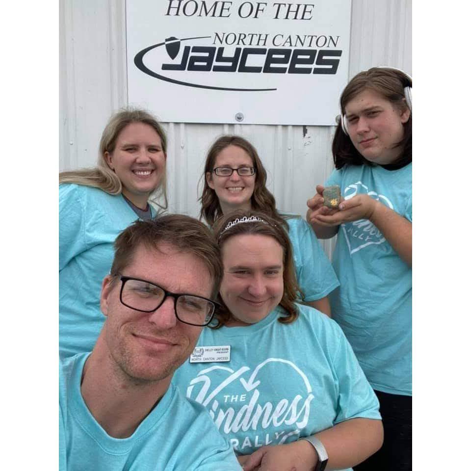 Volunteering as a family!! (technically David wasn't official, but we had to test him ;)