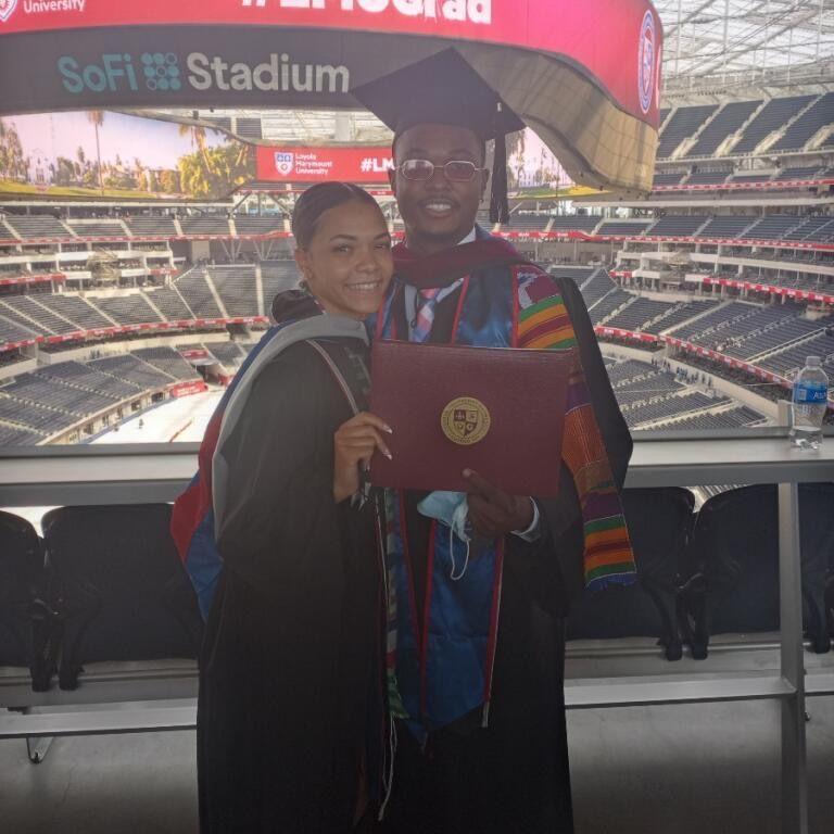 At their college graduation at SoFi Stadium. Charlye then went on to get her Master's from USC!