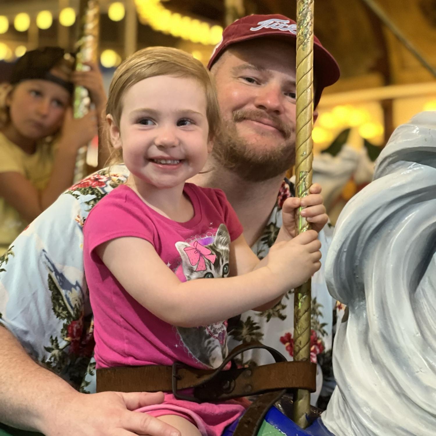Carousal ride with Marlowe and daddy