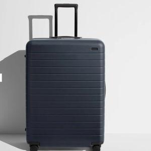 Shop Large & Checked Suitcases in Navy Blue | Away