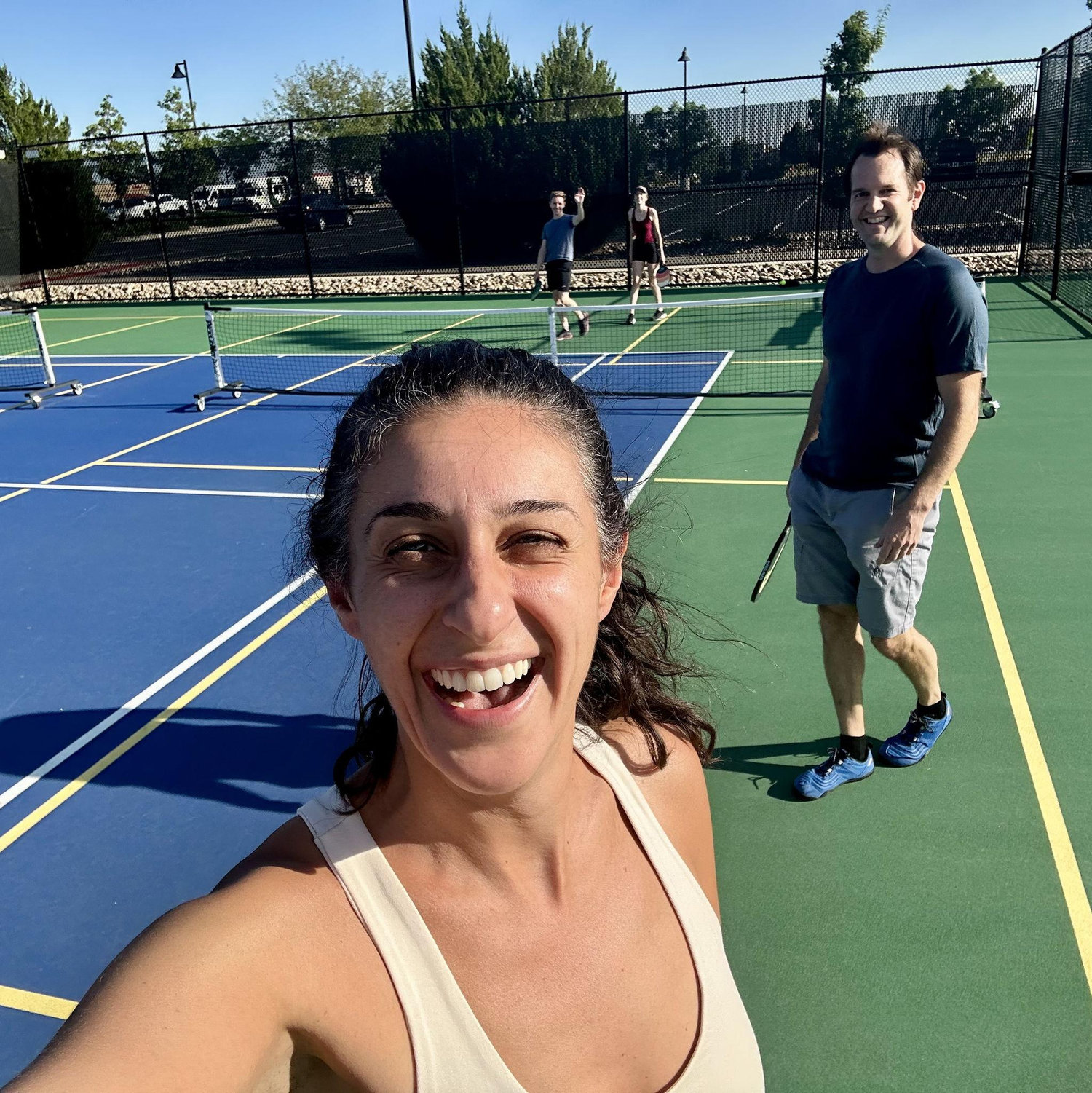 We love playing pickleball together, and even better playing doubles with friends!