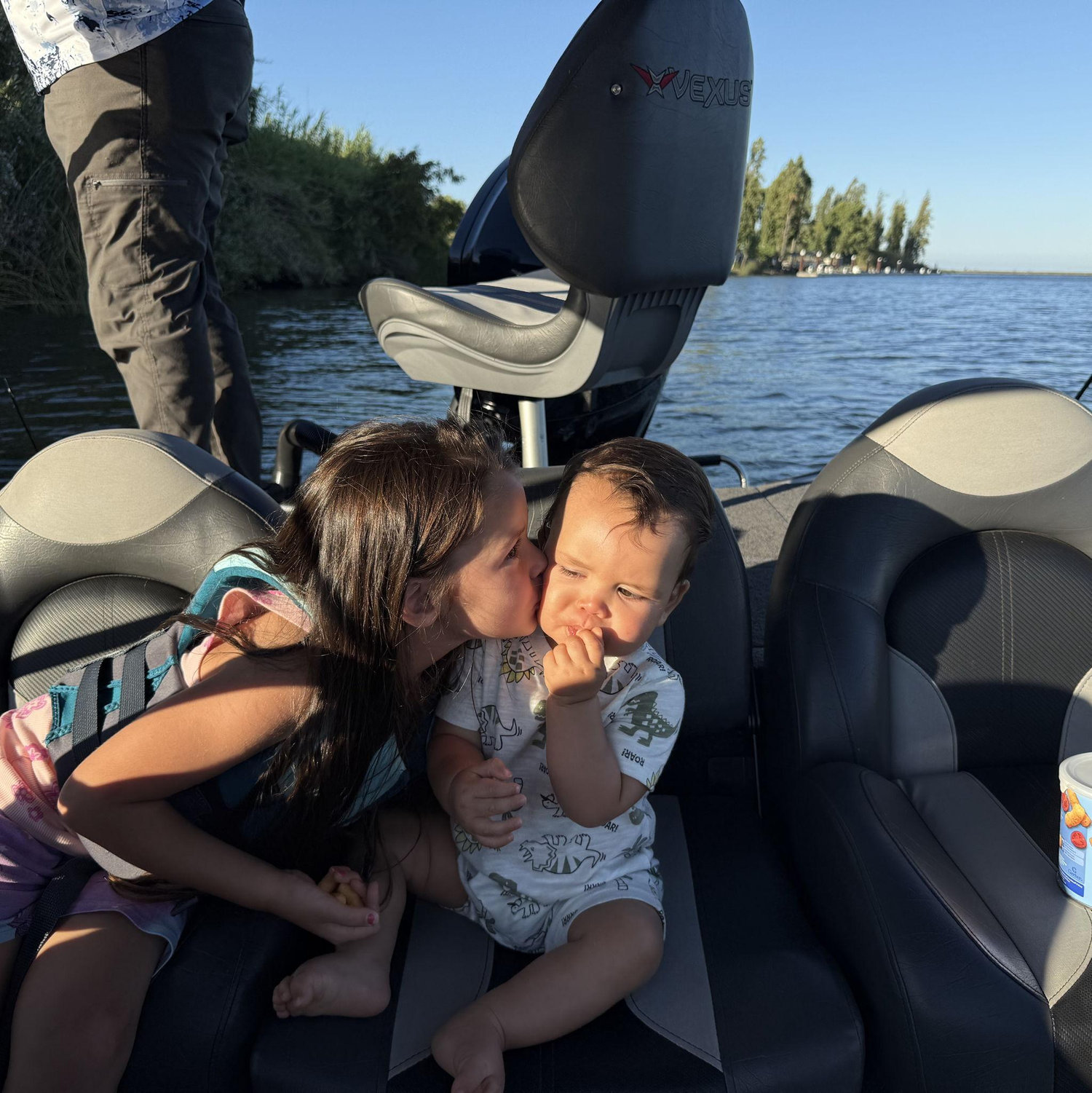 The first time both kids got to ride on nonnos boat!!