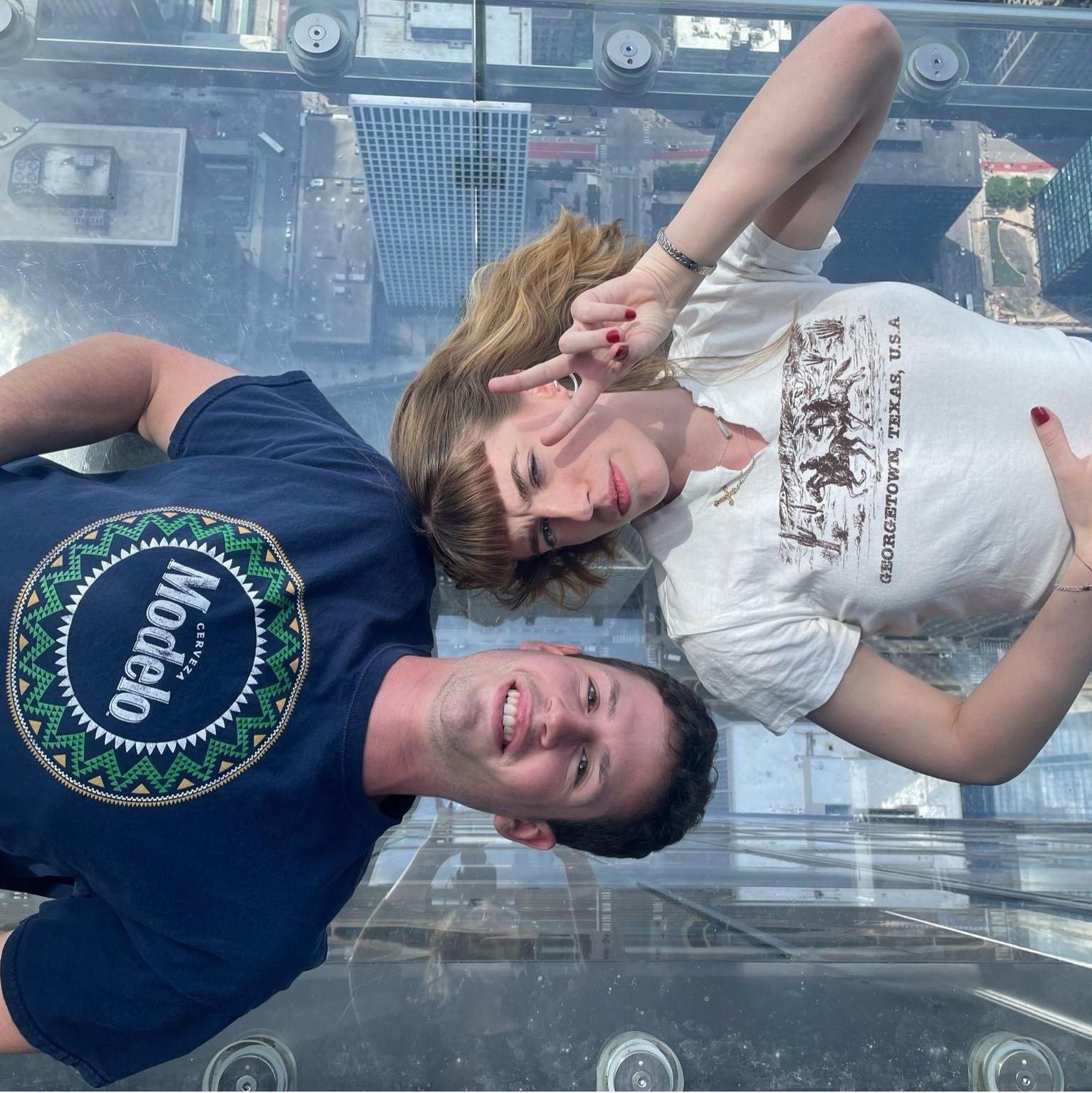 John-Luc and Grace 103 floors up in the Willis Tower on the Chicago Skydeck. John-Luc had to conquer his fear of heights to step out onto the glass platform!