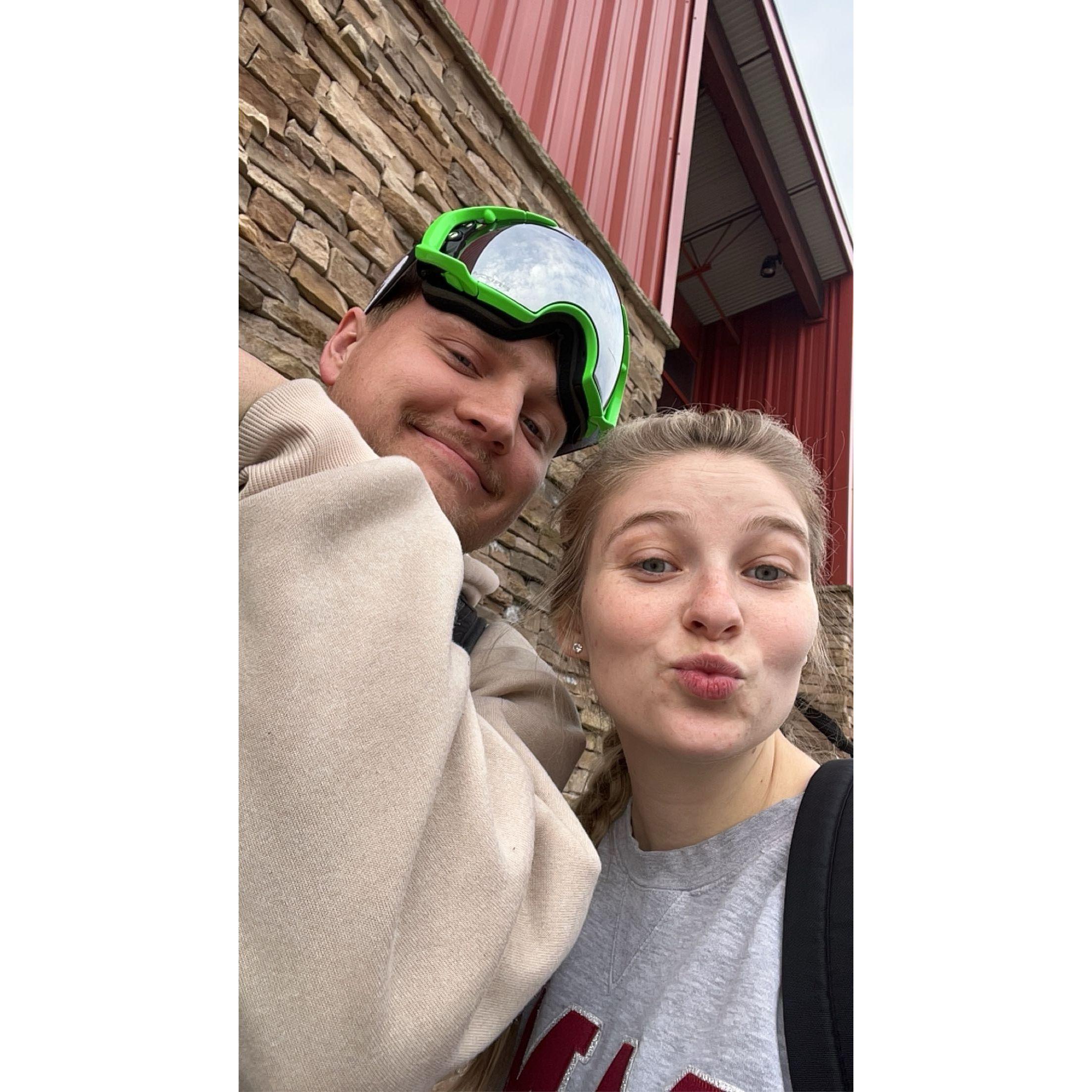 Jordan teaching Liz to Snowboard