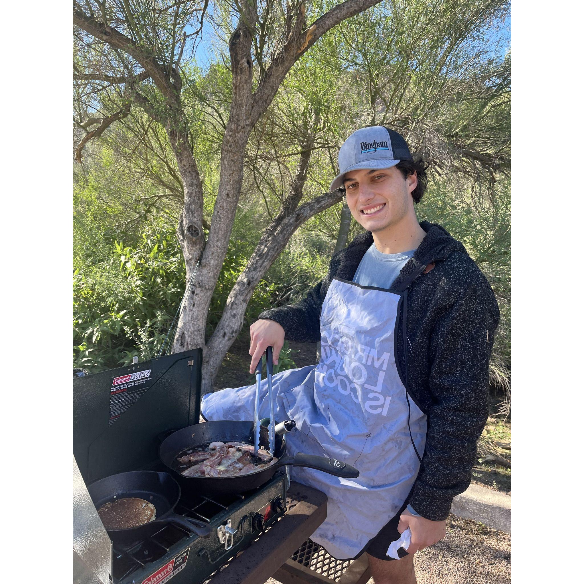 Master chef on the BBQ at our favorite campsite in Phoenix, tortilla flats!