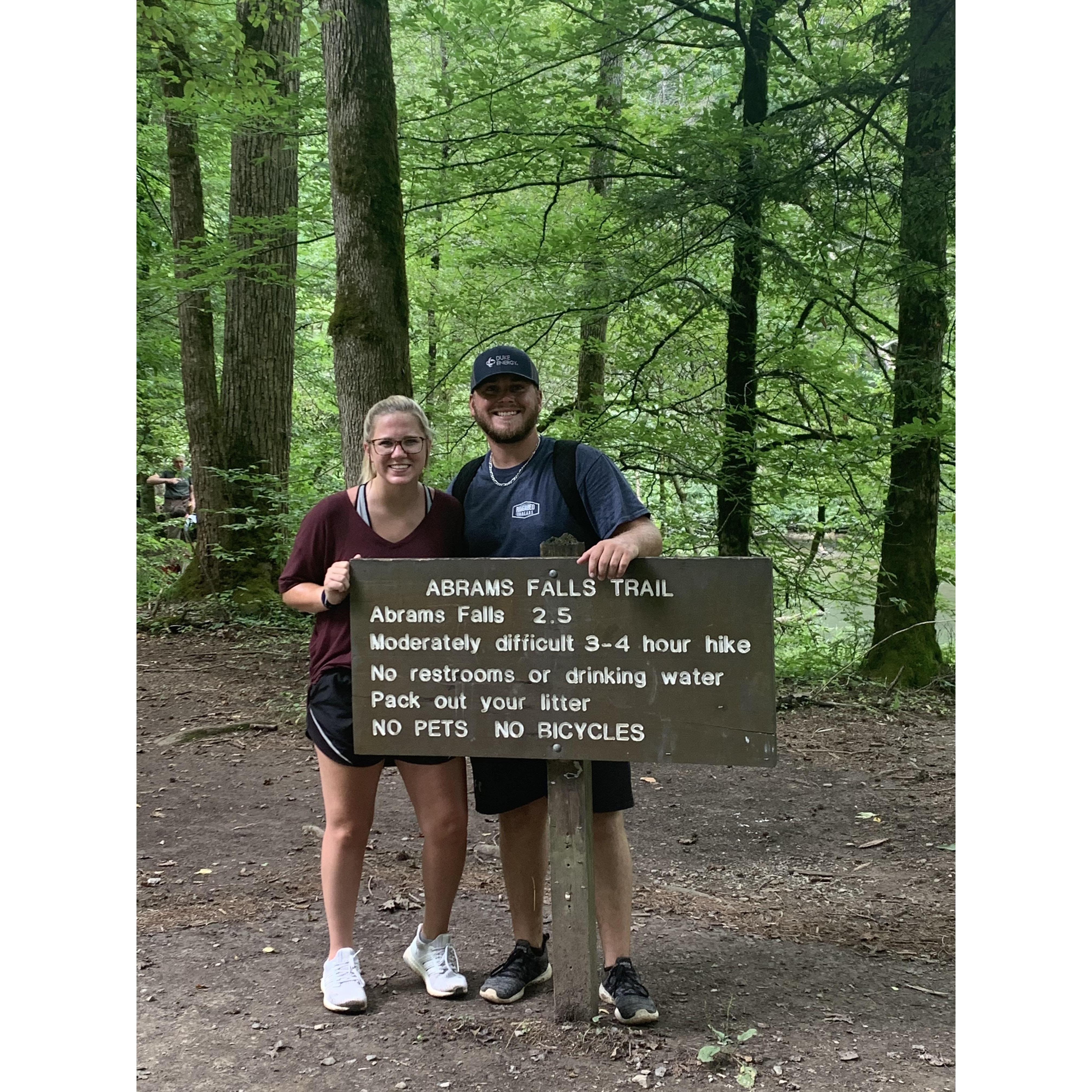 The sign lied. 7 miles, 5 hours later. This was after we finished the "small" hike and we are smiling so big because we were so happy it was over with.