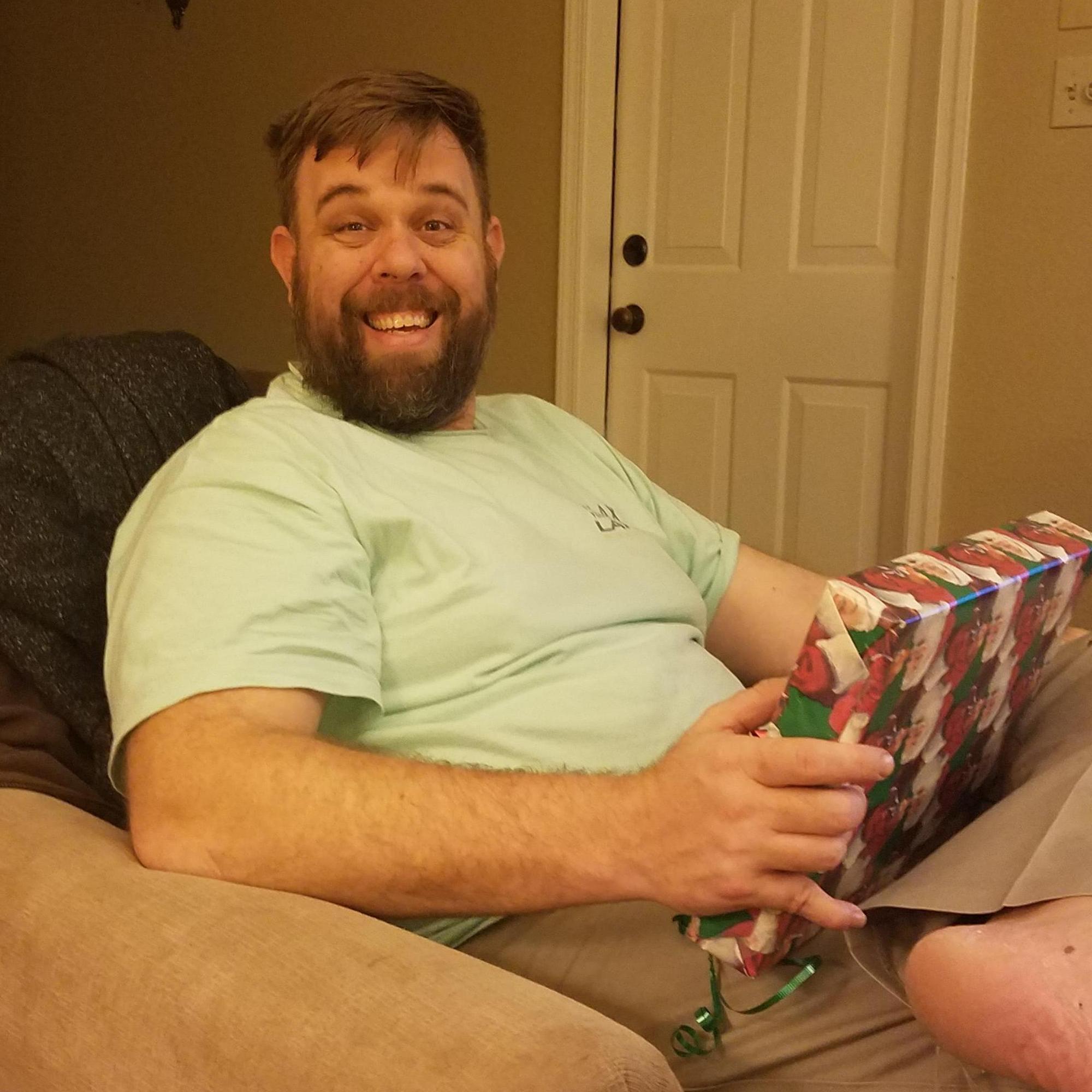 Scott says "Merry Christmas and Happy New Beard" 
This was the Christmas right after he was no longer active duty and he was able to become a lumberjack for a bit. Be prepared for his retirement years