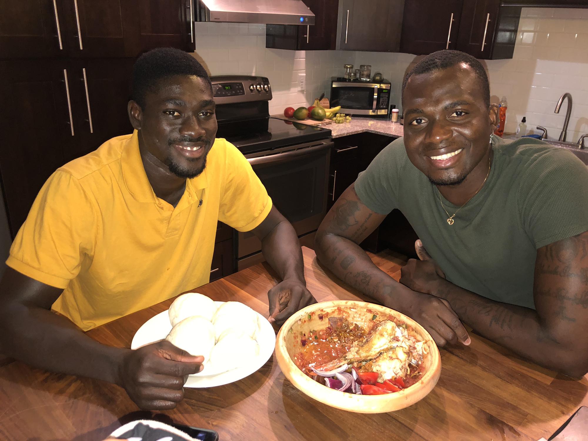 Our first visitor- Will cooked some Ghanaian food for his brother Franny and fought over who got to eat the fish head haha