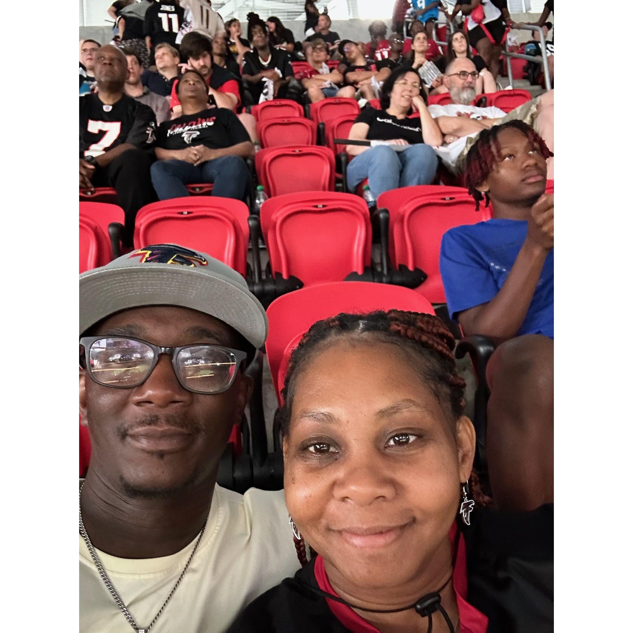 At the falcons game in Mercedes  Stadium.