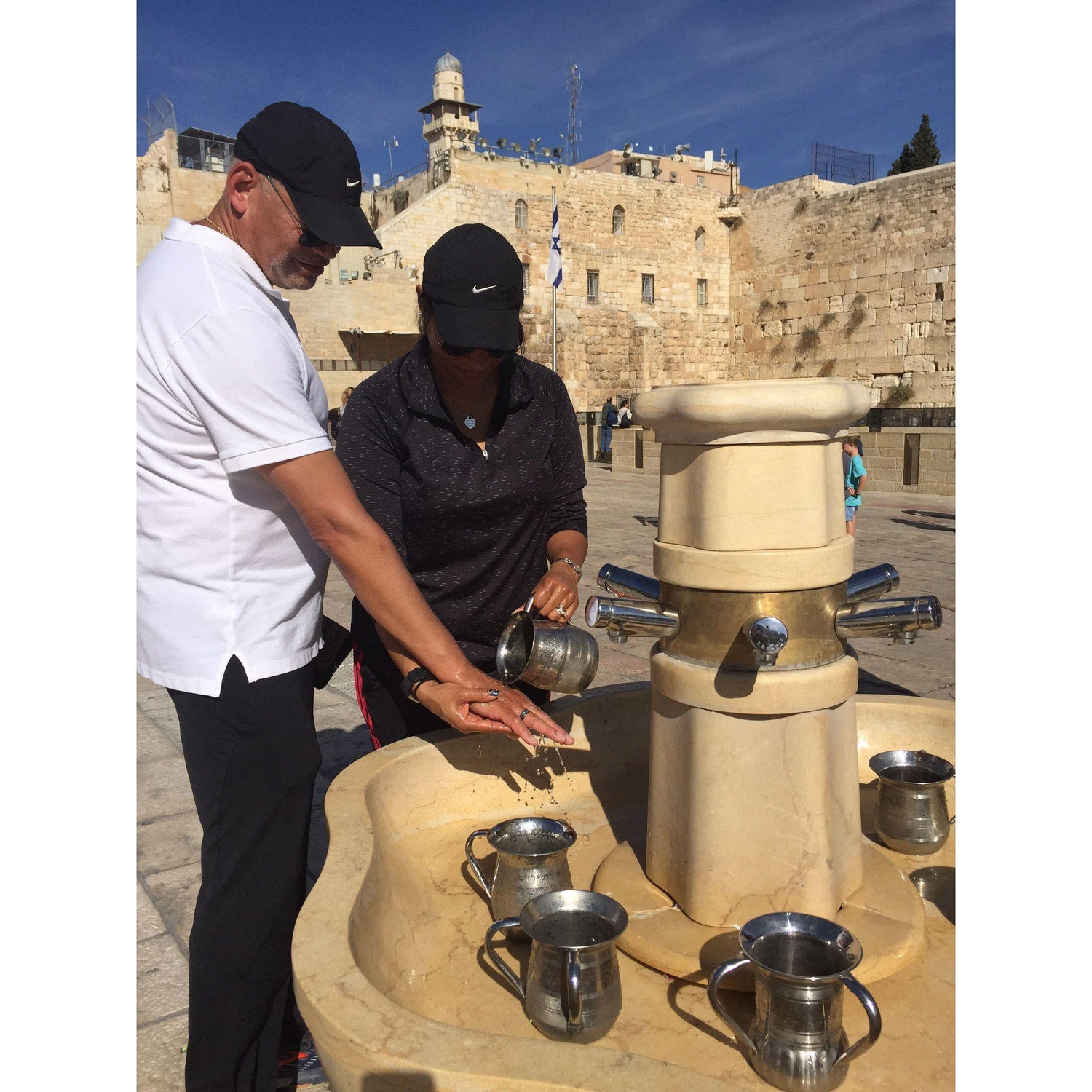 Washing our hands at the Whaling Wall in Isreal.