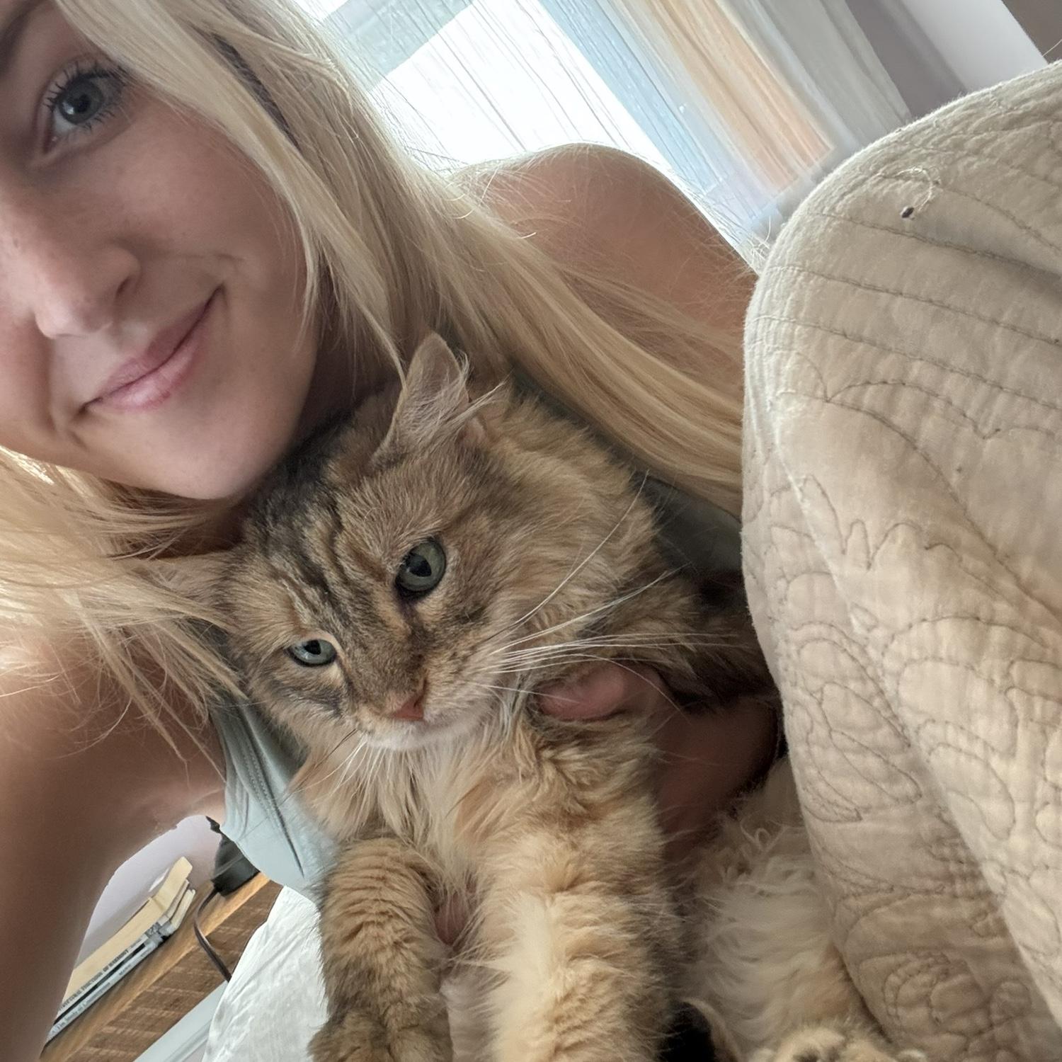 Cuddles with stinky (the cat!)
