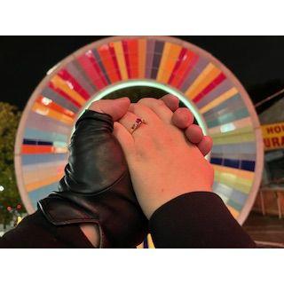 We snapped this photo outside the concert venue we attended, where Cole proposed to me!