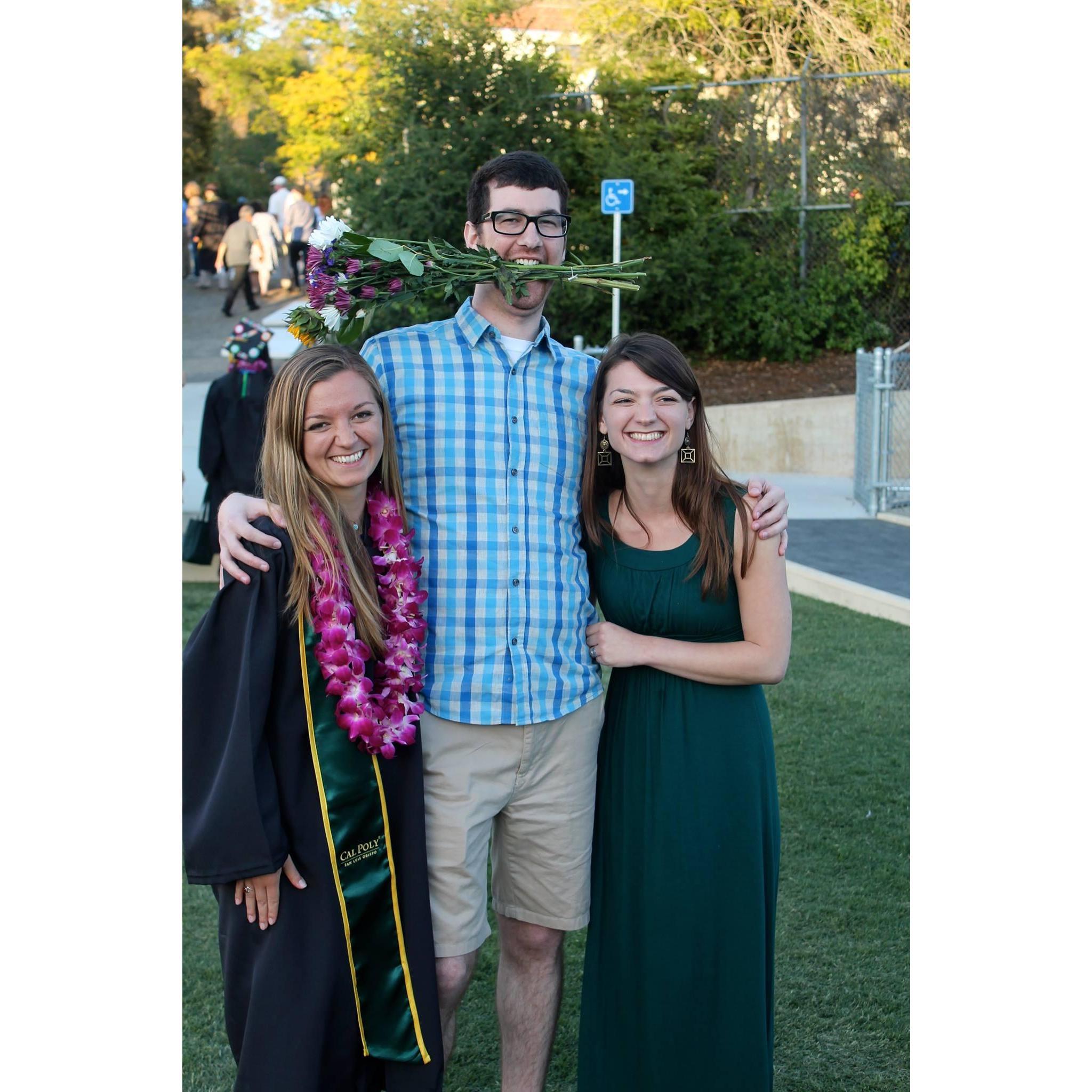 Josh stealing Emily's attention at her Cal Poly graduation in 2015.