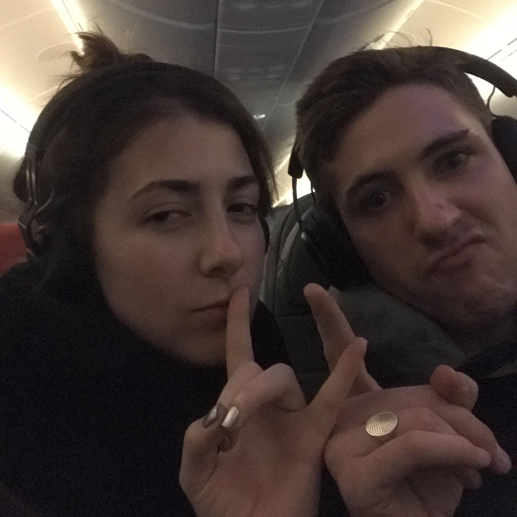 Cracking ourselves up on our flight to Berlin