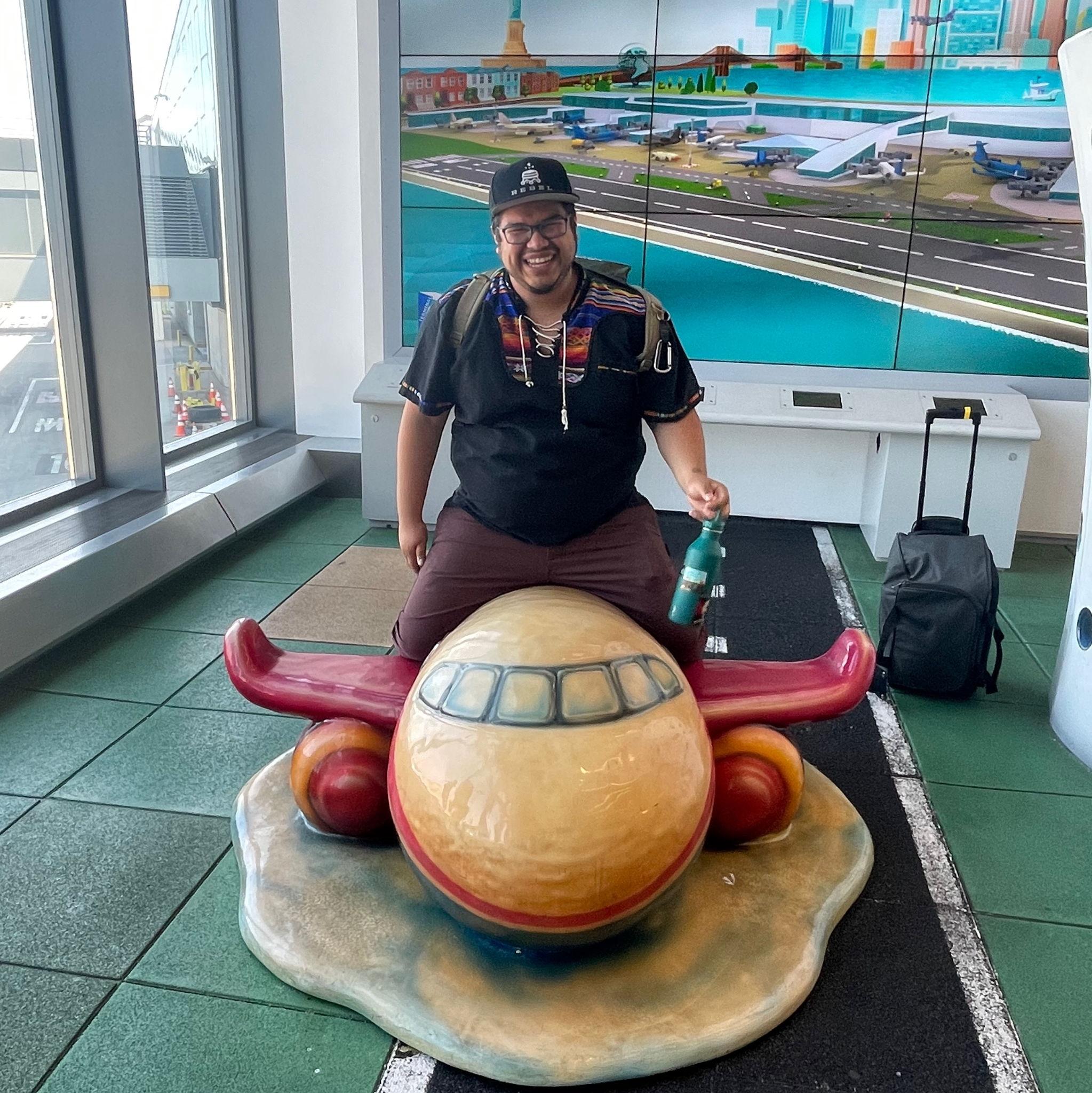 Mandy's Favorite Picture of Moises-It perfectly showcases his playful, infectious joy, LaGuardia Airport Child's Playground, NYC, June 2024