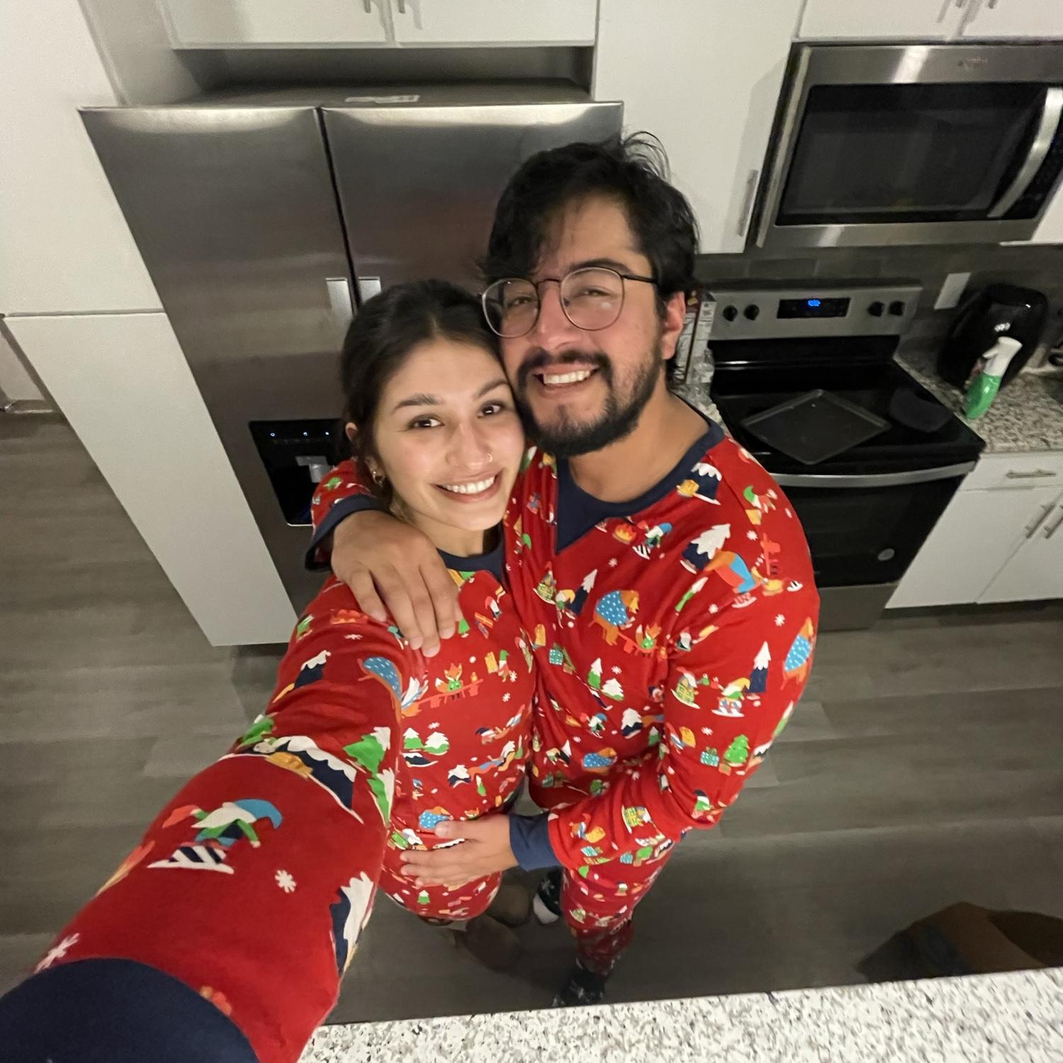 Matching christmas pjs & building gingerbread houses for our first Christmas season together!