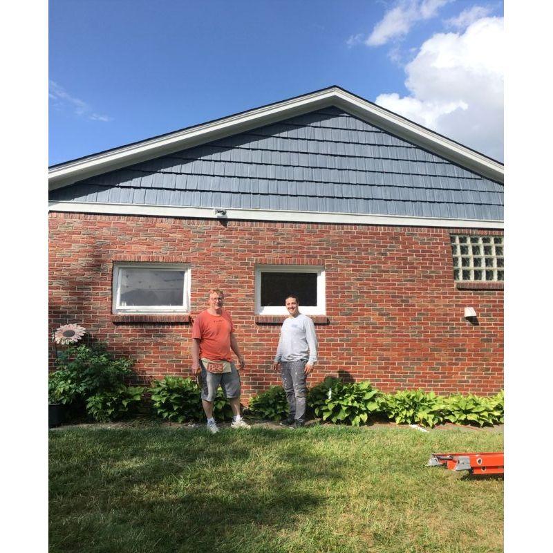 Maddie's Dad and Paul working on the house!