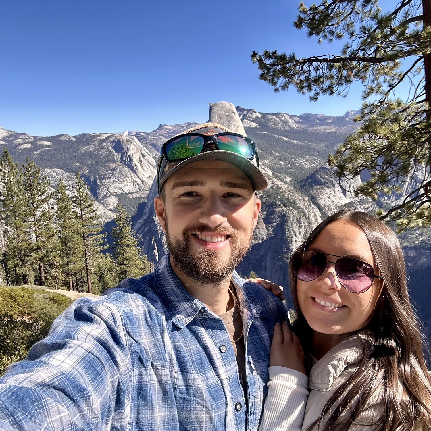 Emily and James visiting Half Dome overlook - Yosemite National Park… minutes before the engagement