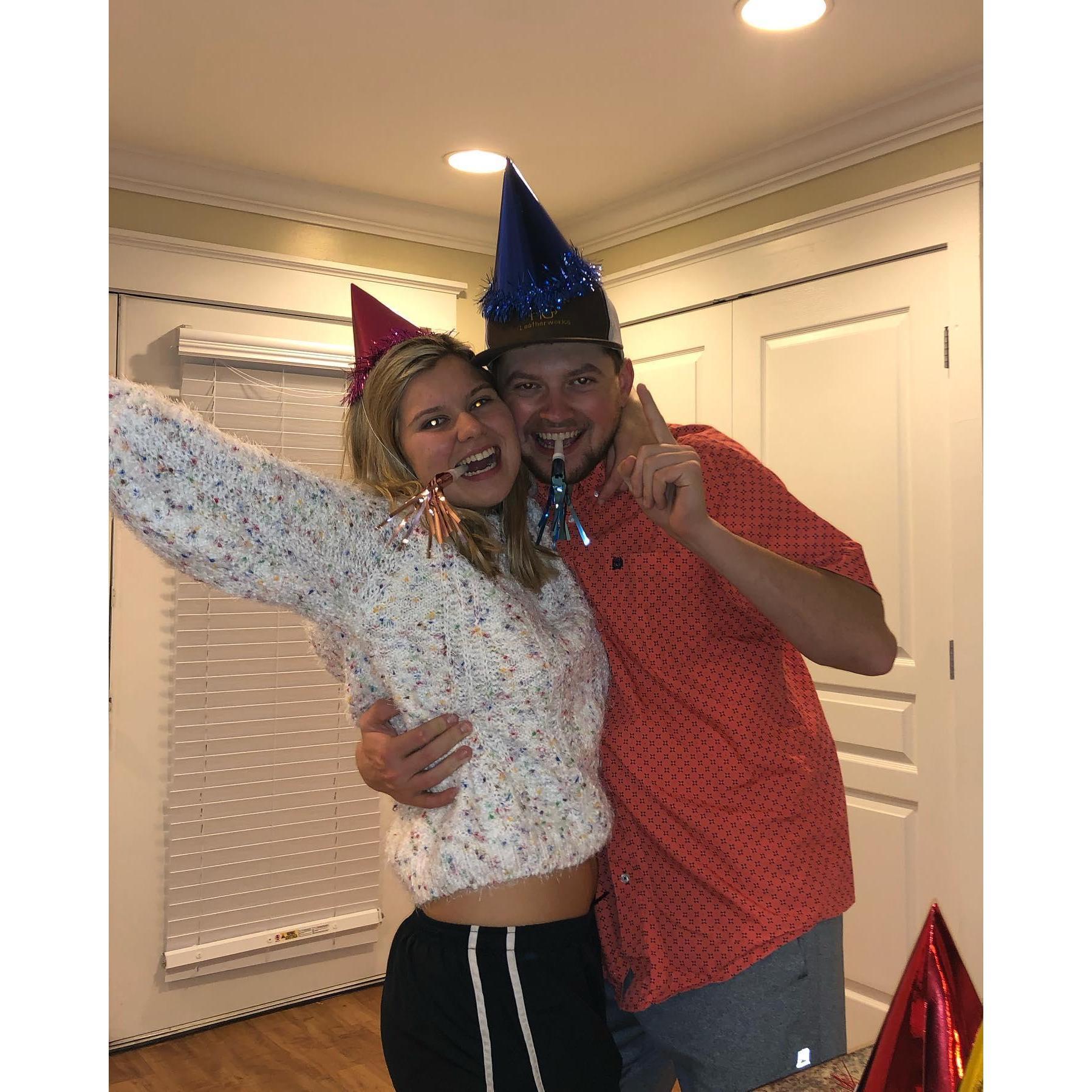 We weren't going to be with each other on the actual day of NYE, so we bought sparkling cider, party hats, and wrote New Year's Resolutions!