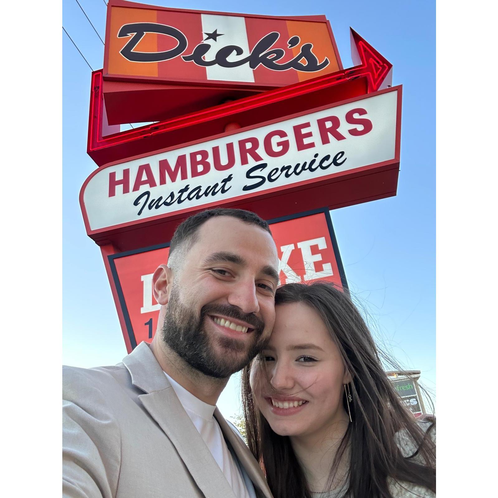 Us celebrating our engagement with some food... food being the key to all of our bonding...