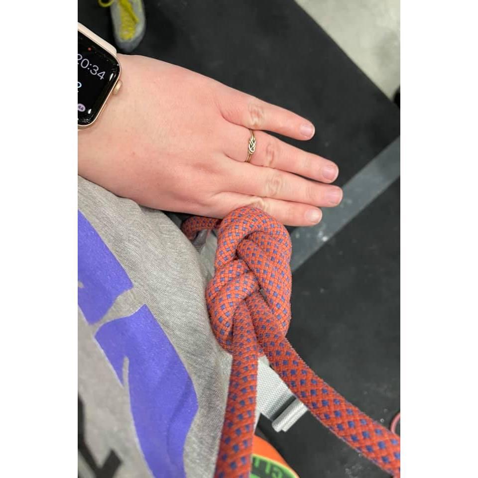 The placeholder ring Tess gave me in the shape of a climbing knot:)