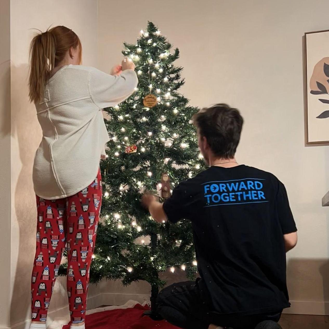 December 2024: Decorating our tree in our house