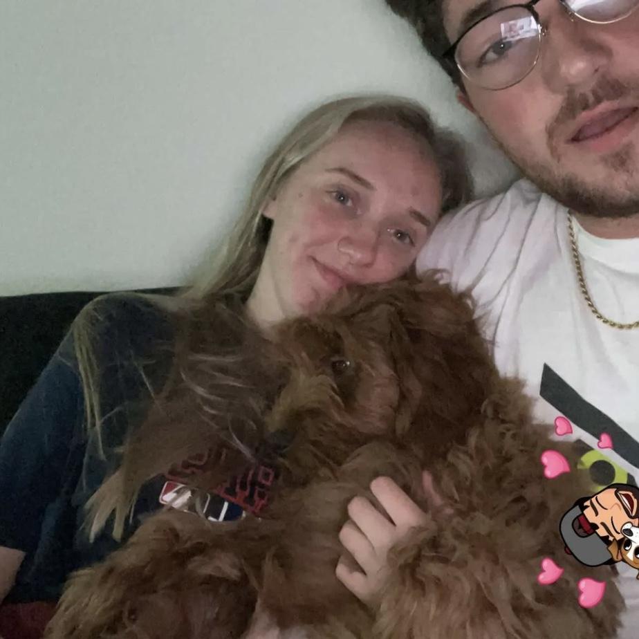 Nathan and Alli loving on their puppy, Oliver!